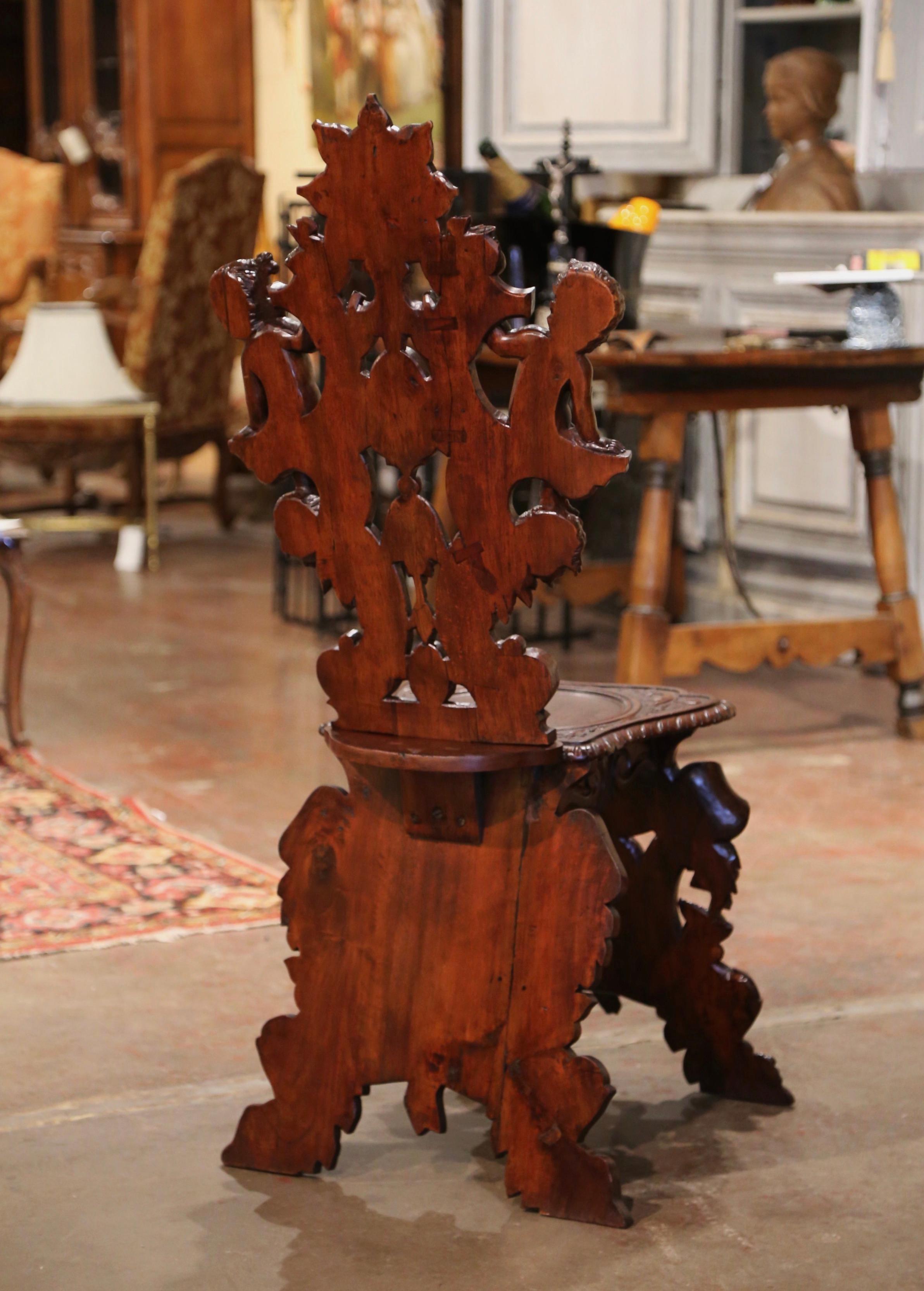 19th Century Italian Renaissance Carved Walnut Sgabello Hall Chair with Putti 4