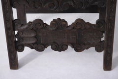 19th-century Italian Renaissance-style throne armchair with carvings.