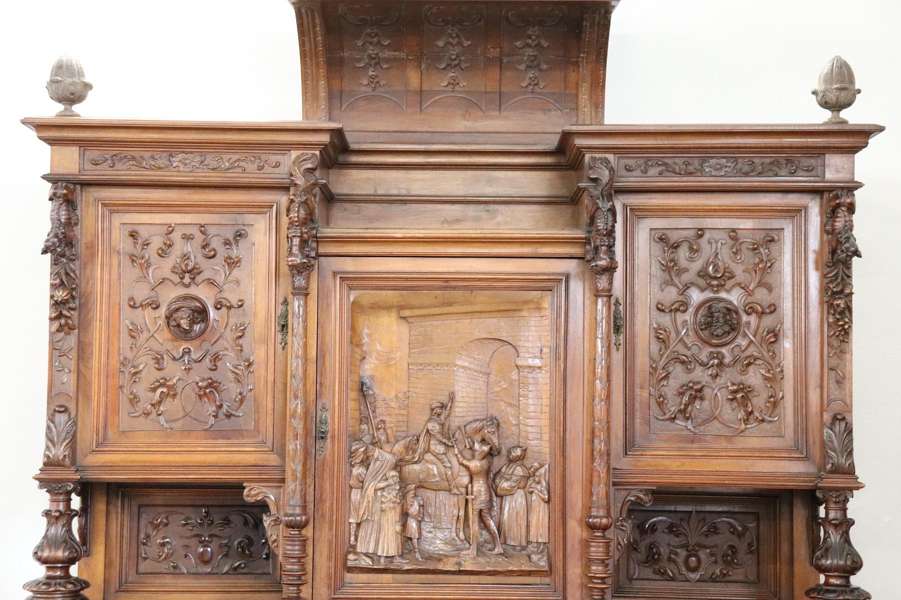 Impressive antique 19th century Italian Renaissance style dining room set 11 pieces:
Two sideboards
An extendable table
Eight chairs
Made entirely of carved walnut wood. The carving work is spectacular made by a great master of wood. We ask you