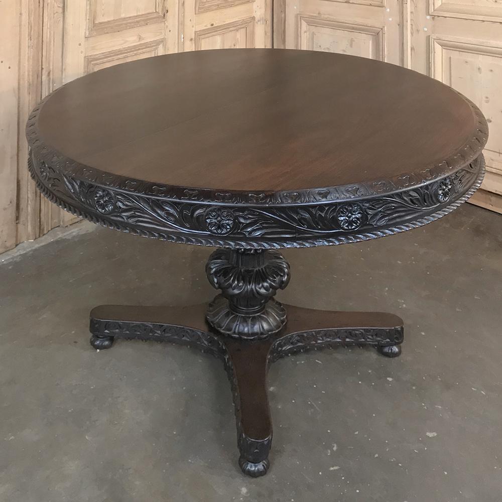 19th century Italian Renaissance walnut center table, dining table is an elegant way to entertain in style! Exquisitely bordered top overlooks the amazing bas relief detail on the apron all around, with rosettes and foliates and gadrooned lower