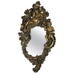 Specchio figurativo in legno dorato rococò italiano del XIX secolo