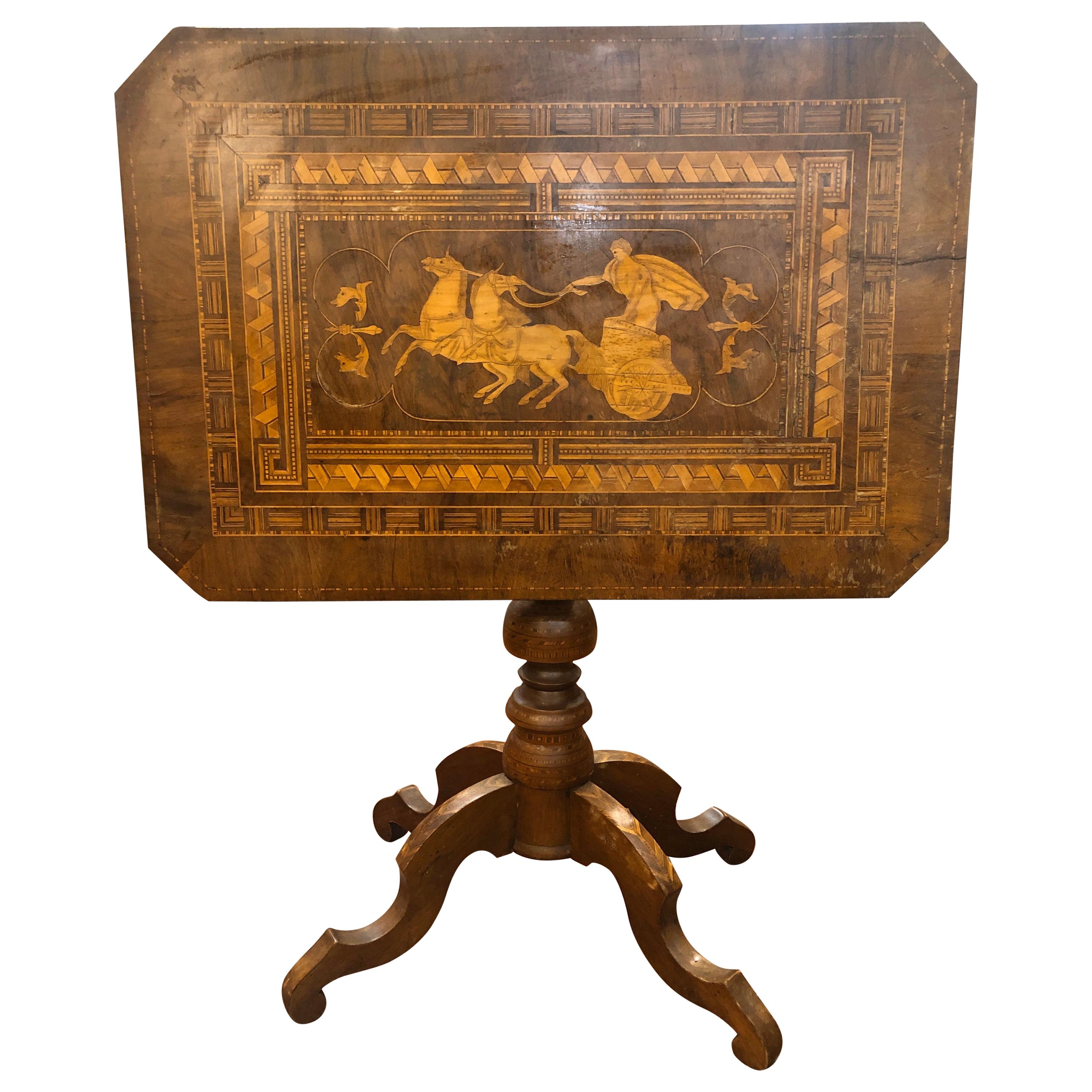 Italian coffee table, from Rollo, 1860-1870. In walnut and inlaid in boxwood, inlay depicting Apollo on the chariot of the sun, geometric inlays on the rest of the surface. Folding sail plan. Now restored. You can see the table before and after the