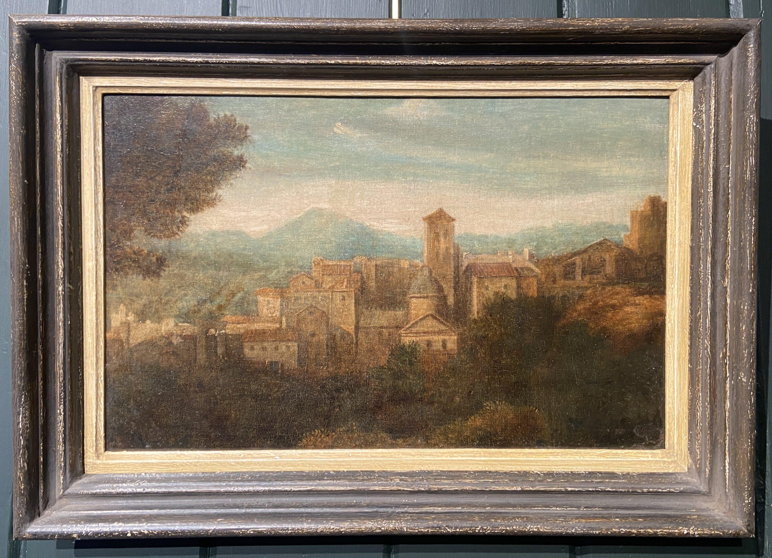 Oil on board
Image size: 13 1/2 x 9 inches (34.25 x 23 cm)
Hand made contemporary style frame

This is a classic Italian landscape painted in an academic style, taking inspiration from the Roman Campagna. This landscape, with its recession through a