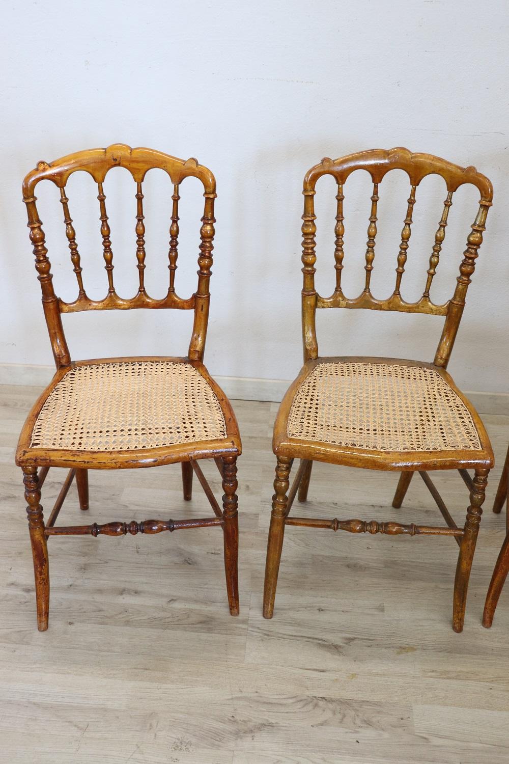 Very nice series of five chairs production of Chiavari Italy cabinetmakers laboratories. All the chairs you see on sale are antique 1890s made of turned wood. The seat is in Vienna straw. The chairs were originally gilded. During a restoration the