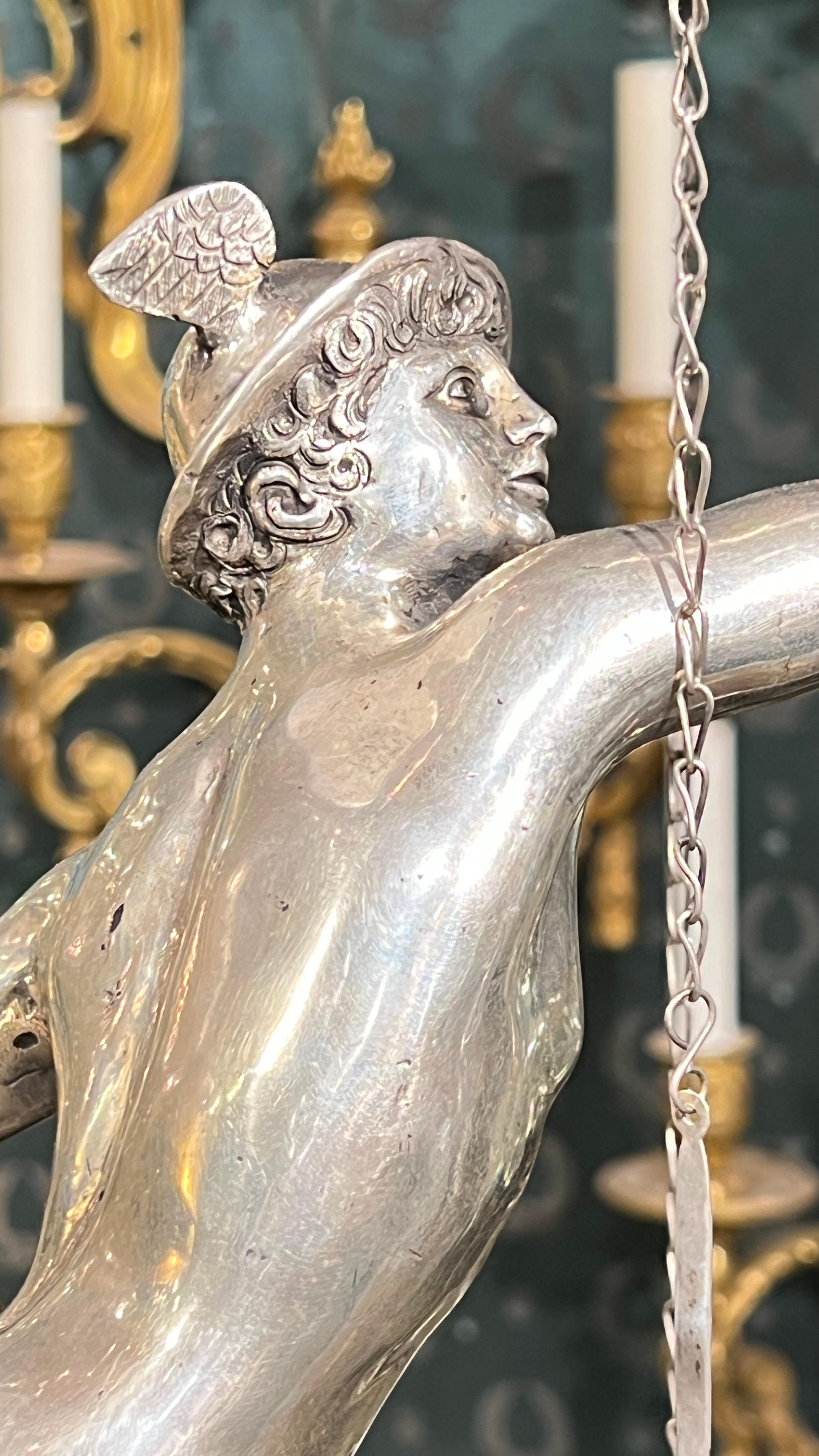 Seltene und außergewöhnliche Öllampe aus Silber des 19. Jahrhunderts mit einer Merkurfigur nach einem Modell von Giambologna, von dem italienischen Silberschmied Angelo Giannotti (1824-1865) aus Bologna, um 1850. Mit der päpstlichen Staatsmarke und