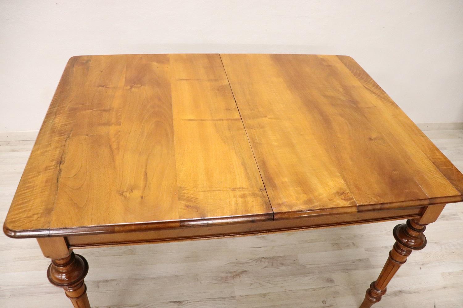 Carved 19th Century Italian Solid Walnut Extendable Antique Dining Room Table