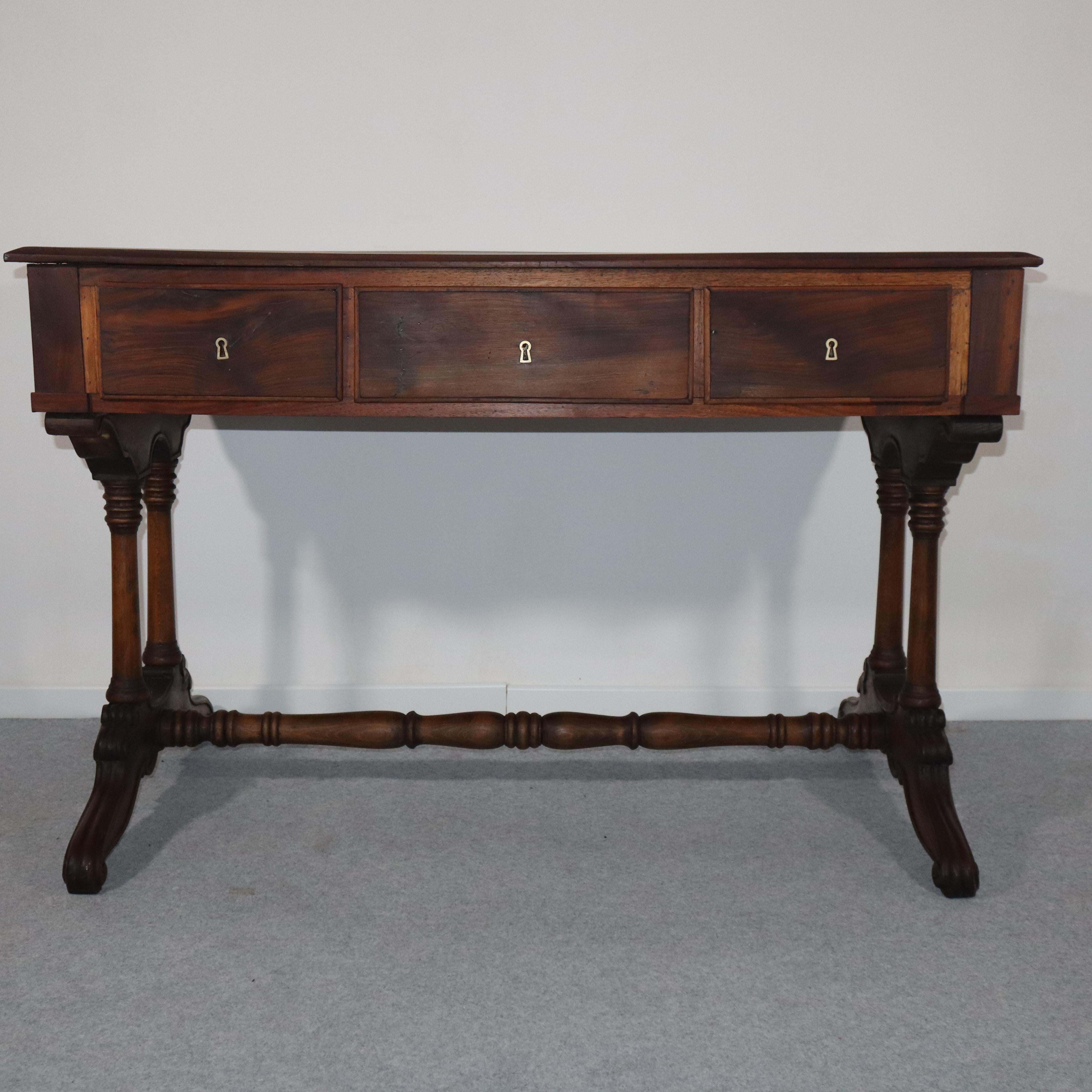 19th Century Italian Solid Walnut Louis Philippe Desk

This desk is crafted from solid walnut, a prized wood known for its beauty and durability. Its robust structure lends an elegant and enduring quality, ensuring the desk will last for many years.