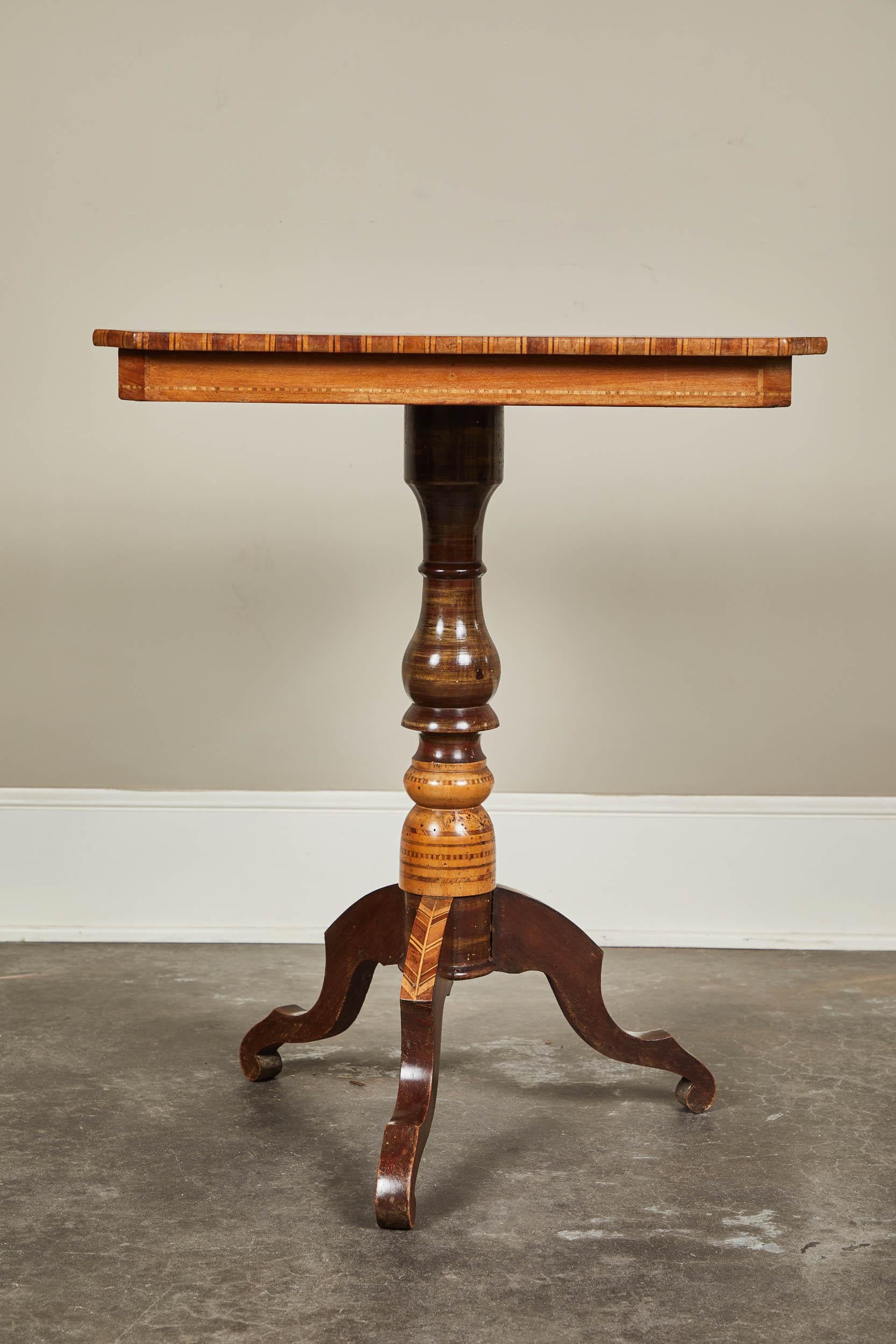 A 19th century inlay and parquetry chess table from Sorrento. Tripod pedestal with inlay detail on feet as well, square shaped top. Shown with chess set for scale, though not included.