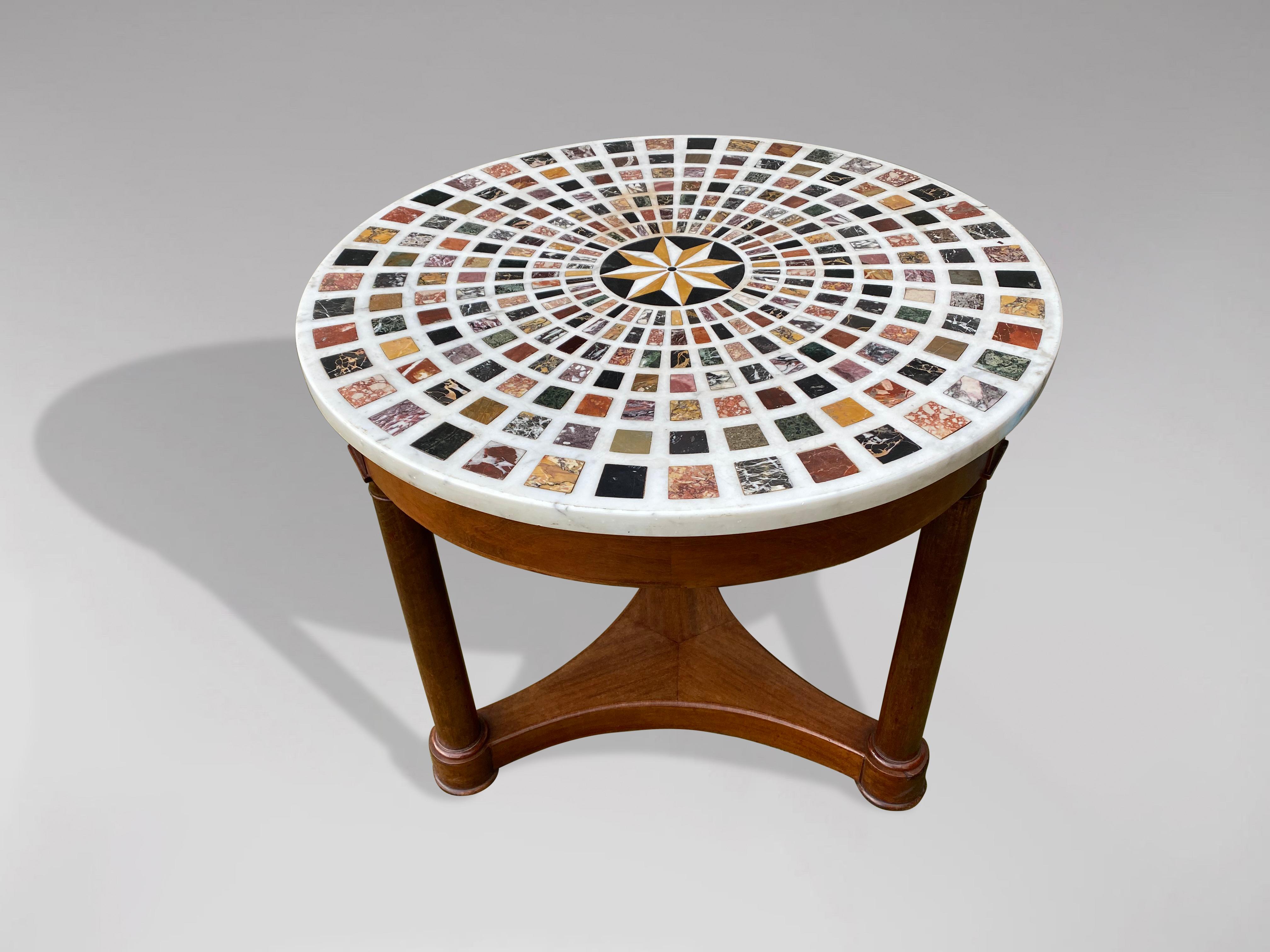 A stunning mid 19th century, Italian specimen marble top and micro mosaic centre table, the radiating sections of marble and semi-precious stones including lapis lazuli, malachite, siena and portor marbles, within a white veined marble outer border,