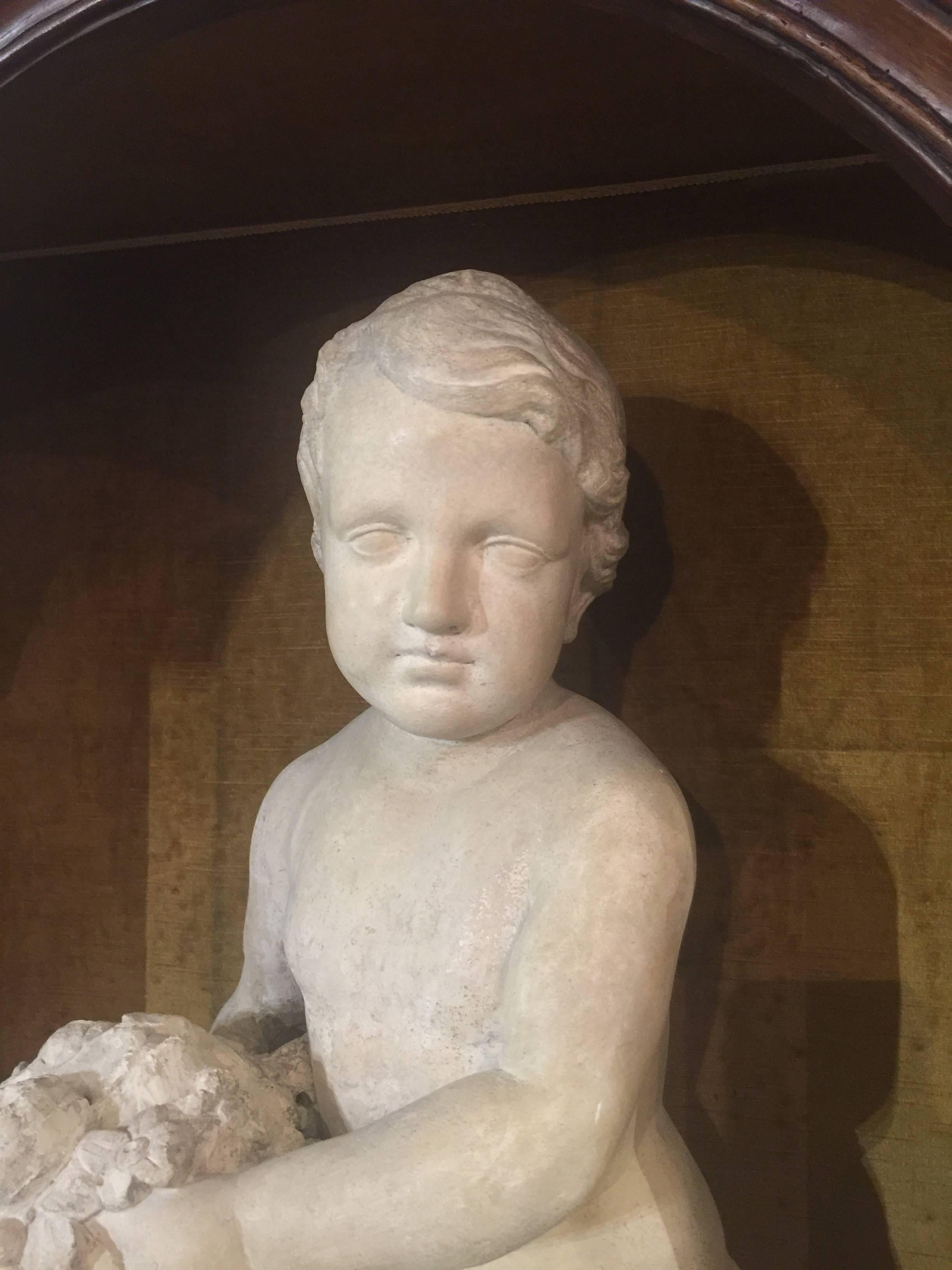 19th Century Italian Stone Sculpture of a Putto Holding a Basket with Flowers For Sale 9