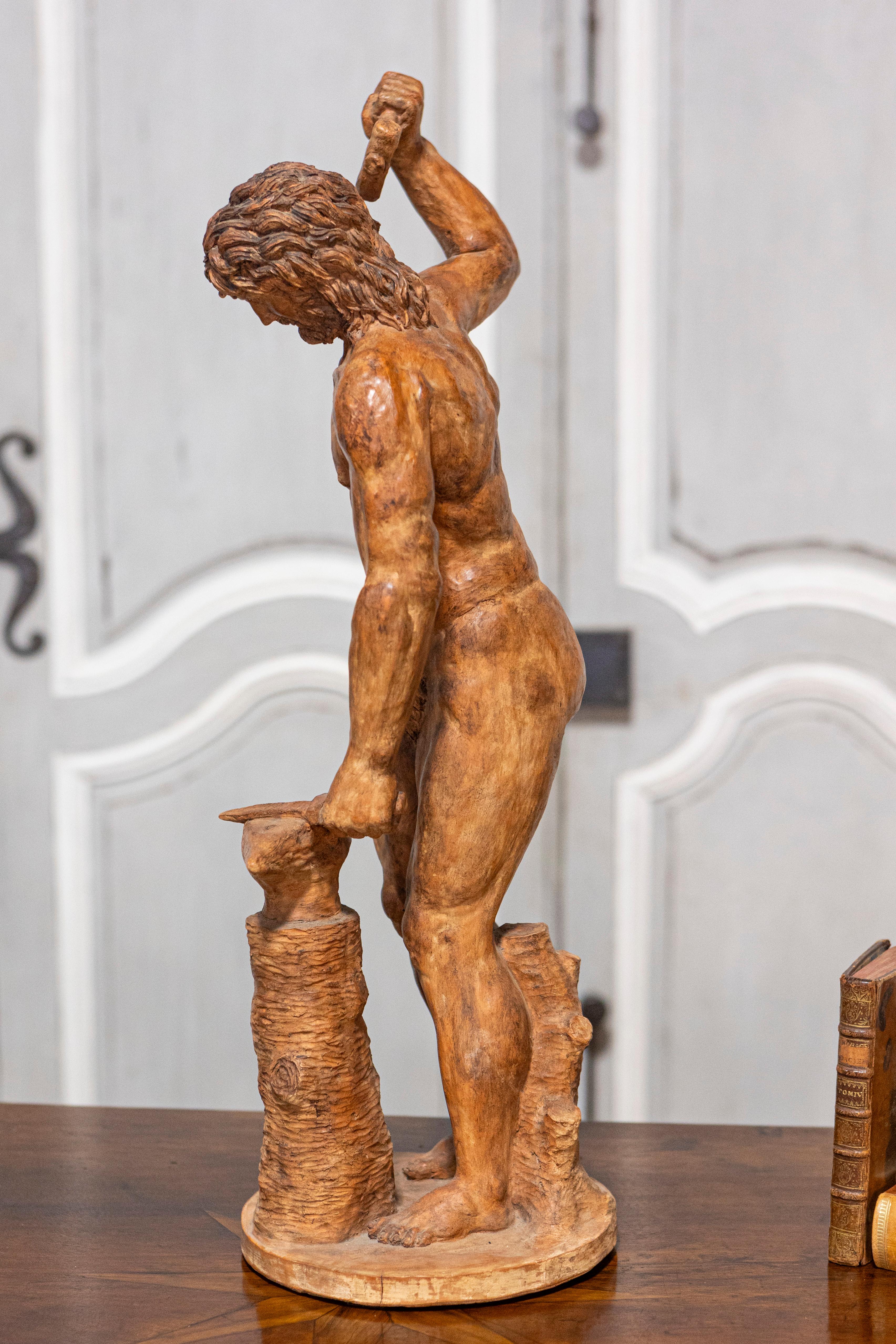 19th Century Italian Terracotta Statuette of Vulcan Forging a Dagger on an Anvil In Good Condition For Sale In Atlanta, GA