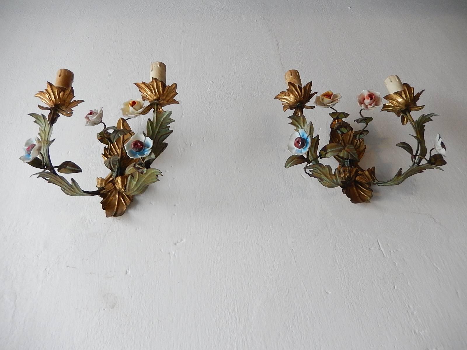 Housing two lights each. Gilt tole details. Original color tole. Handmade porcelain roses and flowers some chipping and flea bites as shown. Re-wired and ready to hang. Free priority shipping from Italy.