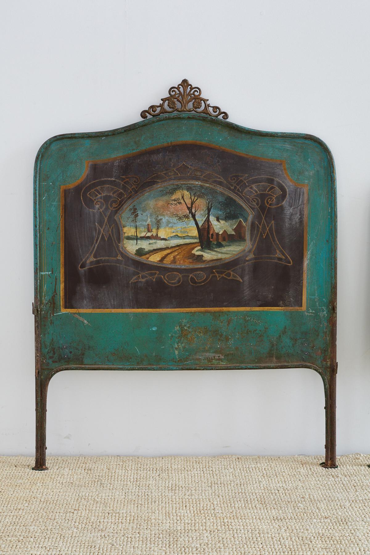 Charming 19th century Italian tole headboard and footboard featuring idyllic landscape scenes over a Robin's egg background. Each board has a filigree scrolled crown on the crest. Well patinated finish with no side rails or hardware. Original