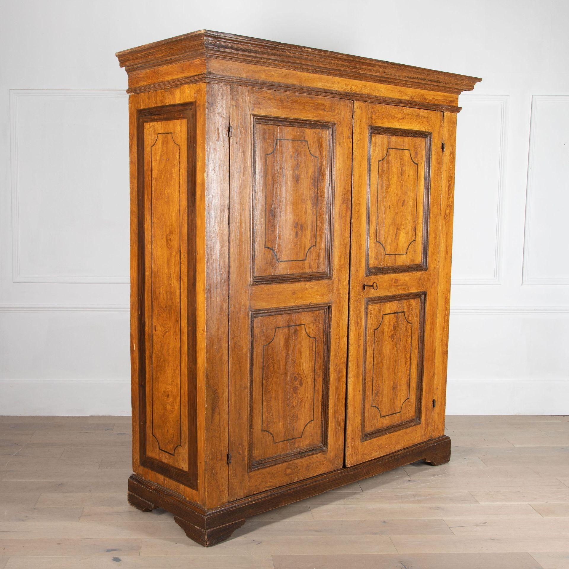19th Century Tuscan armoire.
Of pitch pine wood construction with original painted finish.
With three shelves and one low drawer to the interior, wonderful aged patina.