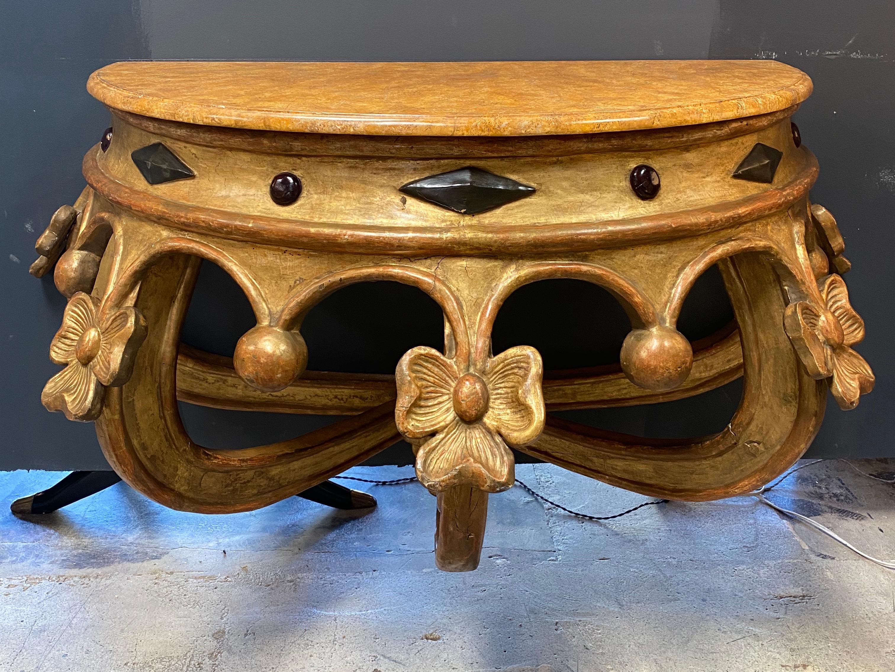 Extraordinary Italian venetian console from 1920 with an amazing shape.
Nothing touches, nothing clashes, which gives this piece of furniture a completely peaceful yet strong expression. A piece like this will stand the test of time.