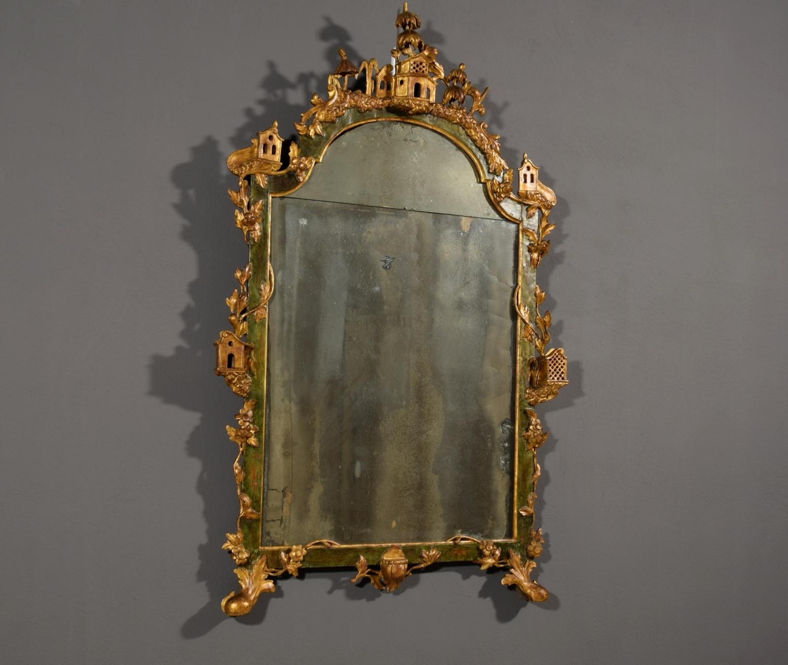 19th century, Italian Venetian gilded lacquered wood mirror

Particular mirror in Louis XV style, made in Venice (Italy) in the 19th century.
The mirror consists of a curious wooden frame richly carved, lacquered and gilded. The frame is