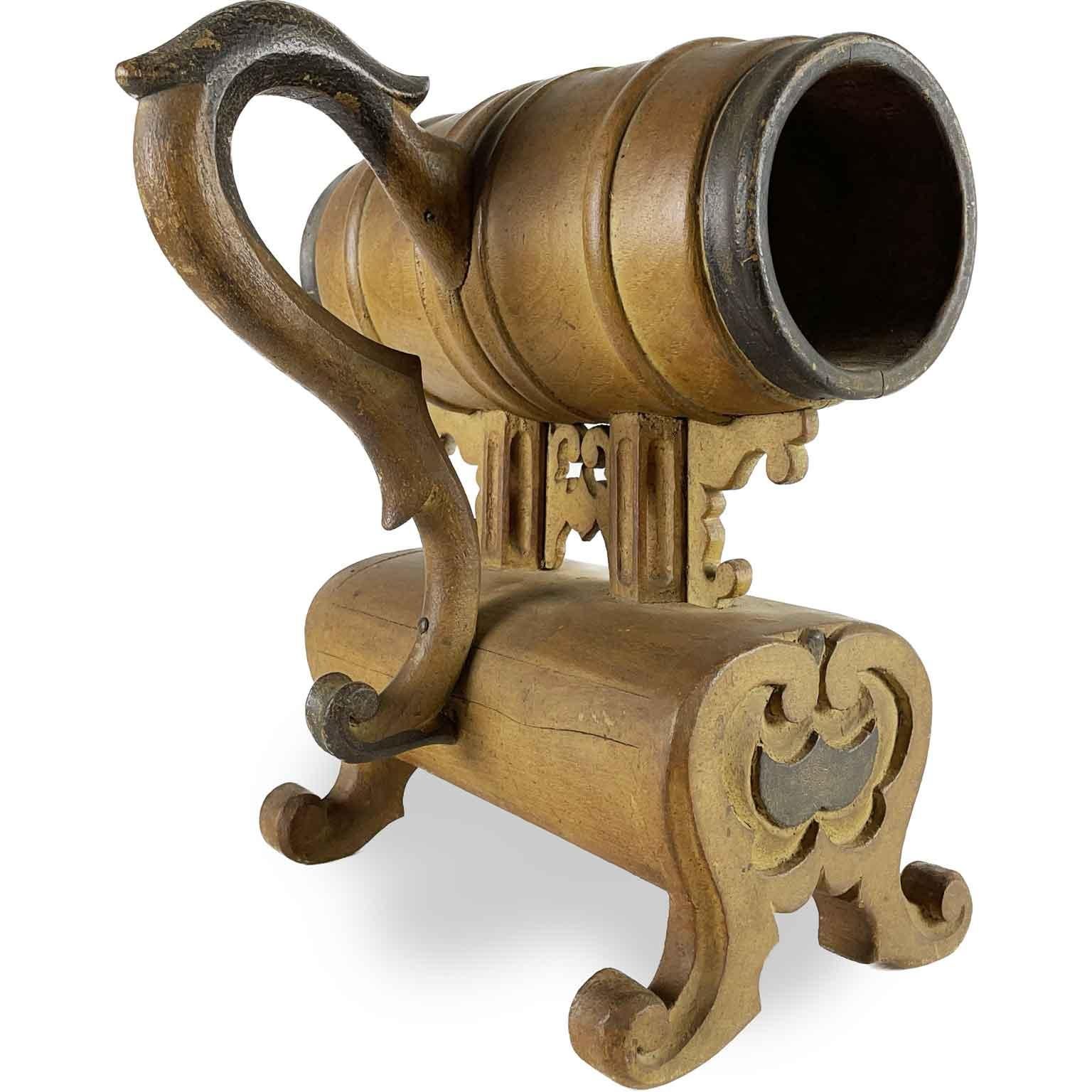 19th century Italian Confraternity Voting Urn of Tuscan origin realized with turned and carved poplar wood. The barrel-shaped central body, in which hands were inserted to insert the ballot ball into one of the two holes connected to the small