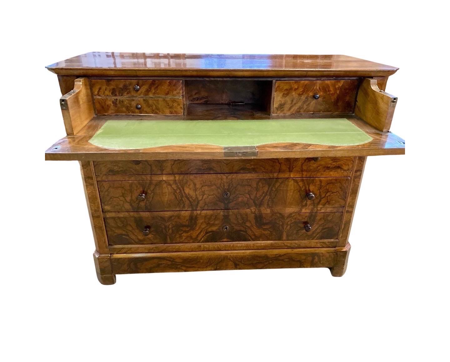 Louis Philippe butler's desk / chest of drawers made in Italy in the mid 1800s using walnut. The first thing that will catch your attention of this beautiful piece is the stunning burl walnut veneer; was just masterfully done: the symmetry, the