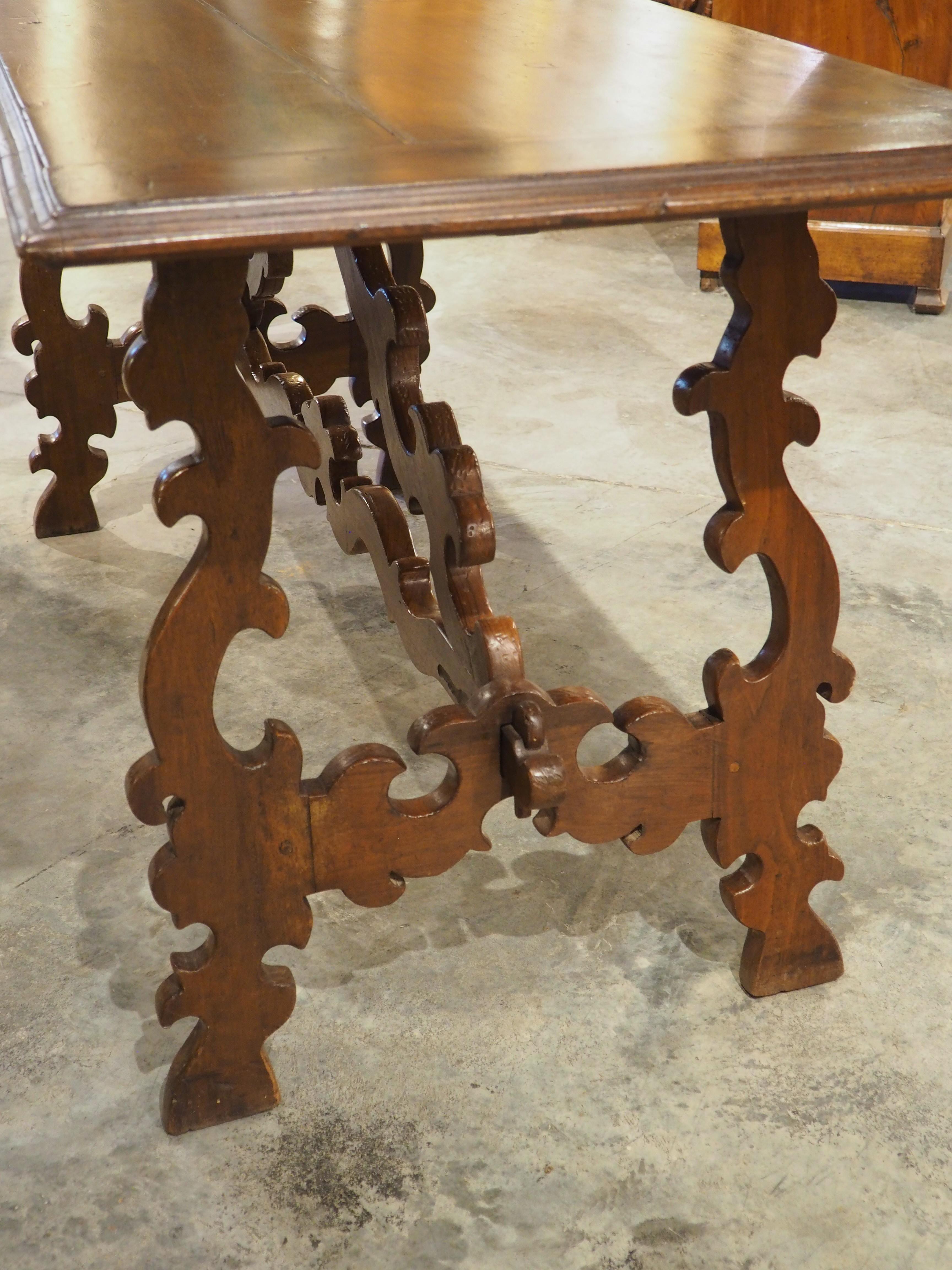 Hand-Carved 19th Century Italian Walnut Lyre Leg Table with Baroque Style Wooden Stretchers For Sale