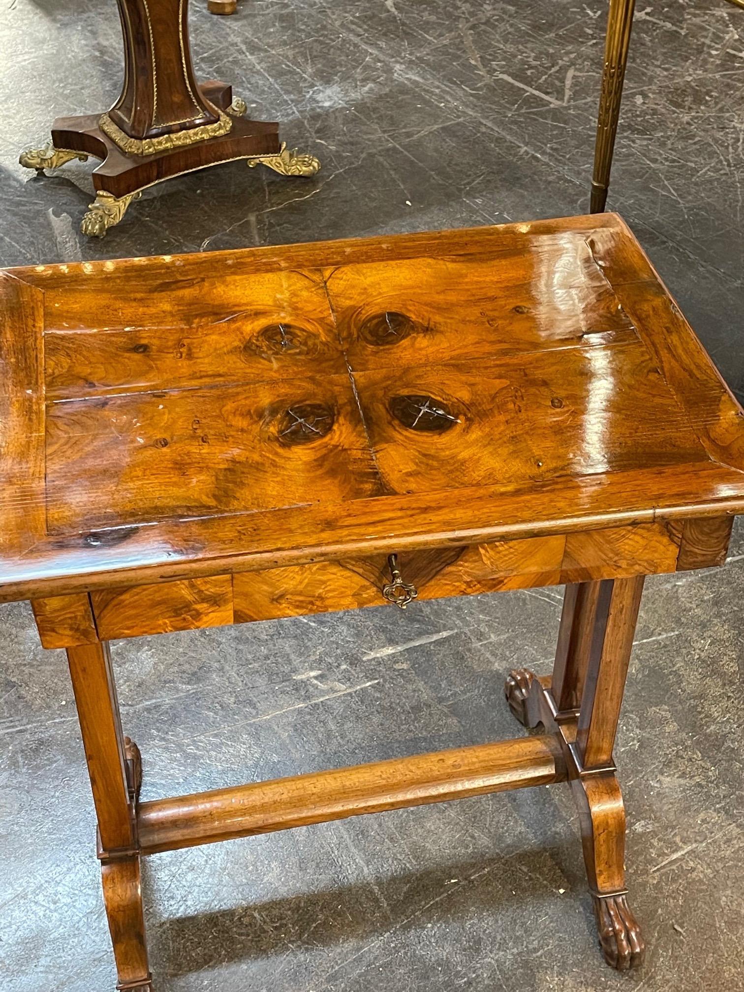 Beautiful 19th century Italian walnut side table. The piece has a very fine finish and 1 drawer. An elegant addition!