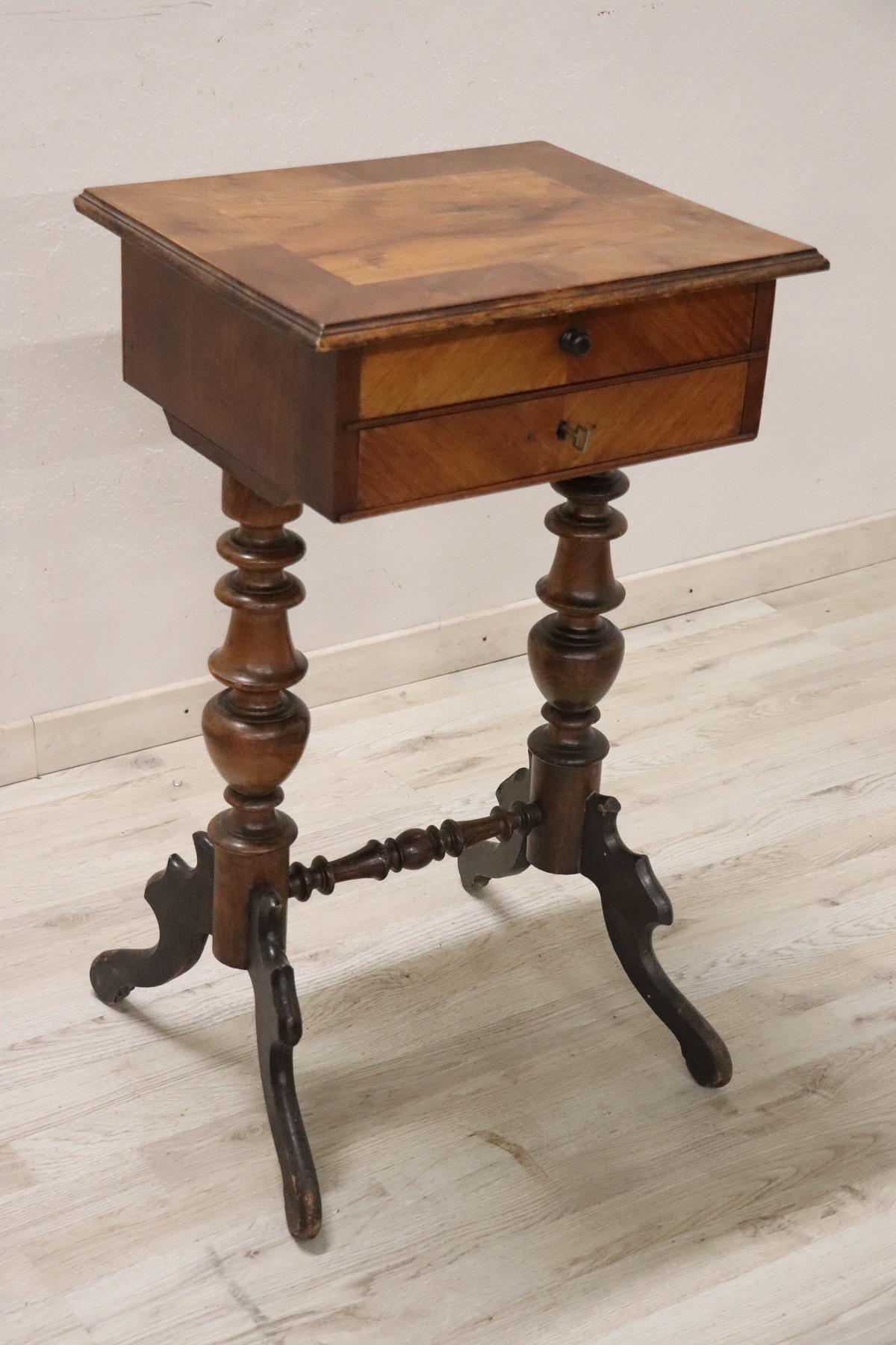 Beautiful side table, 1880s in walnut. The plan presents precious work of briar. Table with elegant turned legs. Two comfortable drawers on the front. Internal compartments for your jewelry. The table is in perfect conditions.
