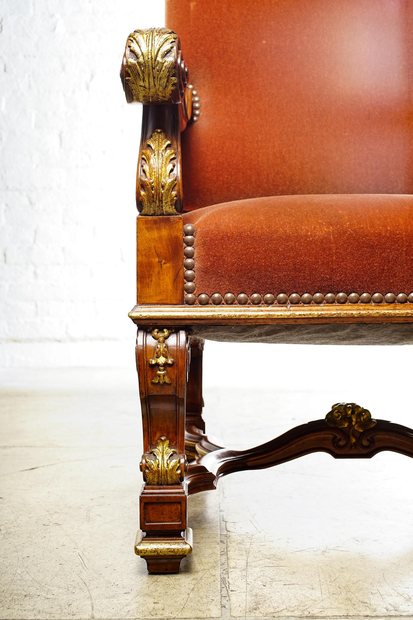 Single 19th century Italian finely carved walnut throne chair with mohair fabric.