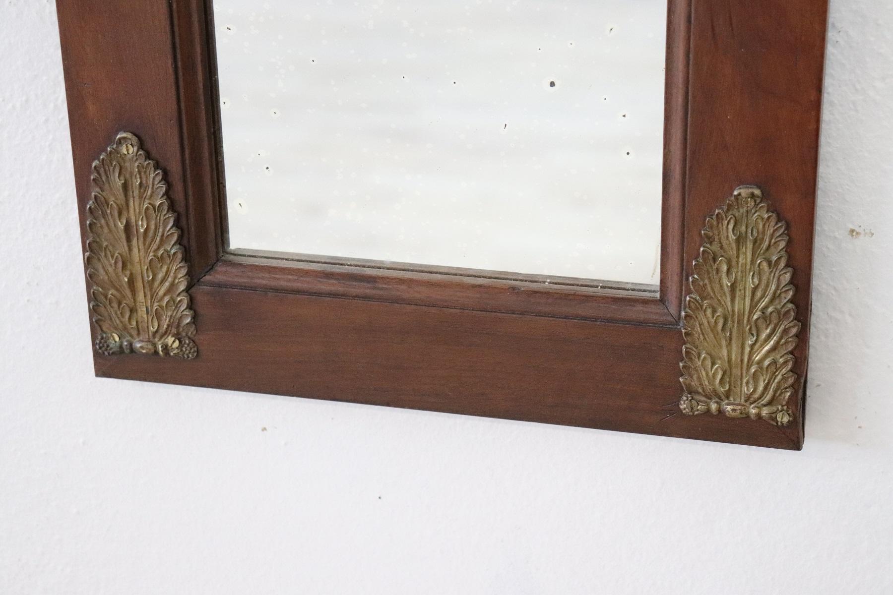 Carved 19th Century Italian Walnut Wood Wall Mirror with Gilded Bronze Decorations