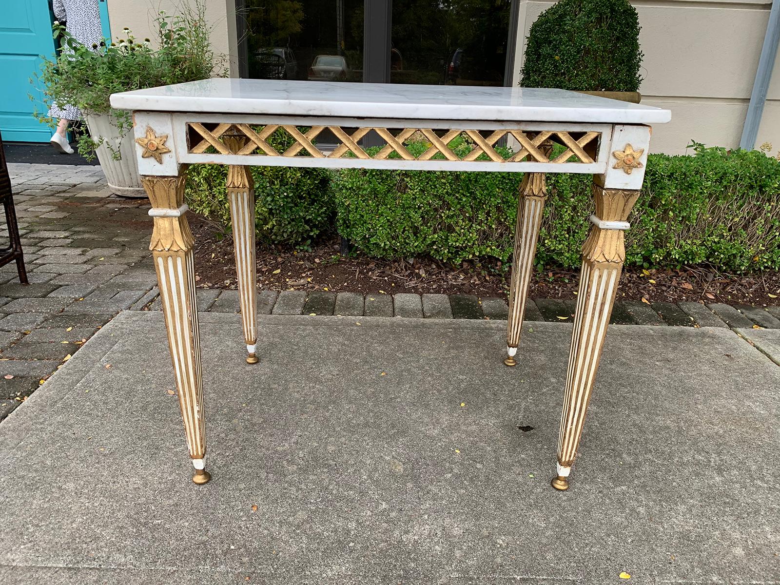 19th century Italian white and gilt painted rectangular side table with white marble top.
