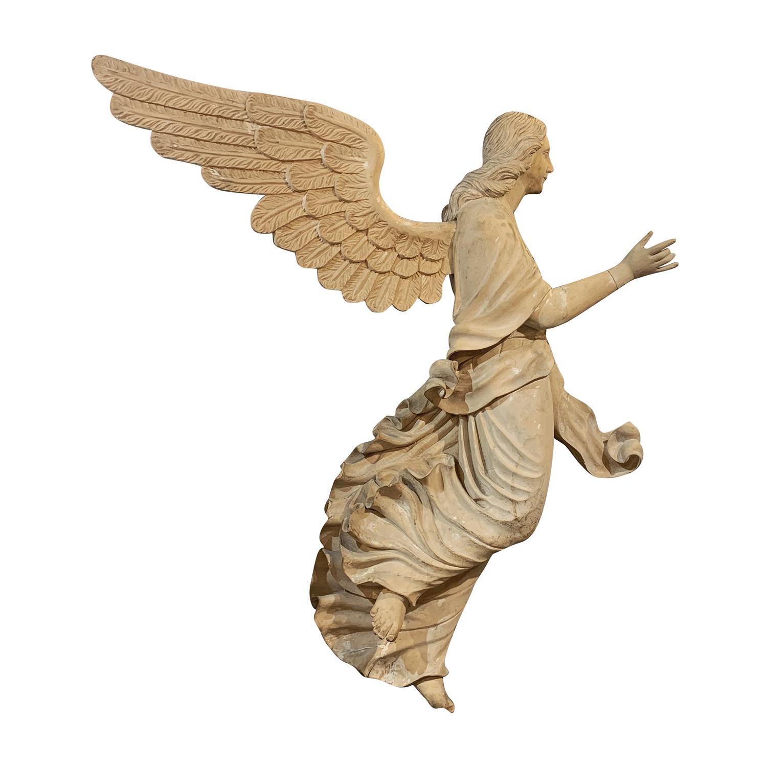 An antique Italian pair of early 19th century half ?relief wooden angels made of hand carved Basswood, enhanced by unique wood carvings, in good condition. Wear consistent with age and use. Minor damages due to age, circa 1810-1830, South Tyrol,