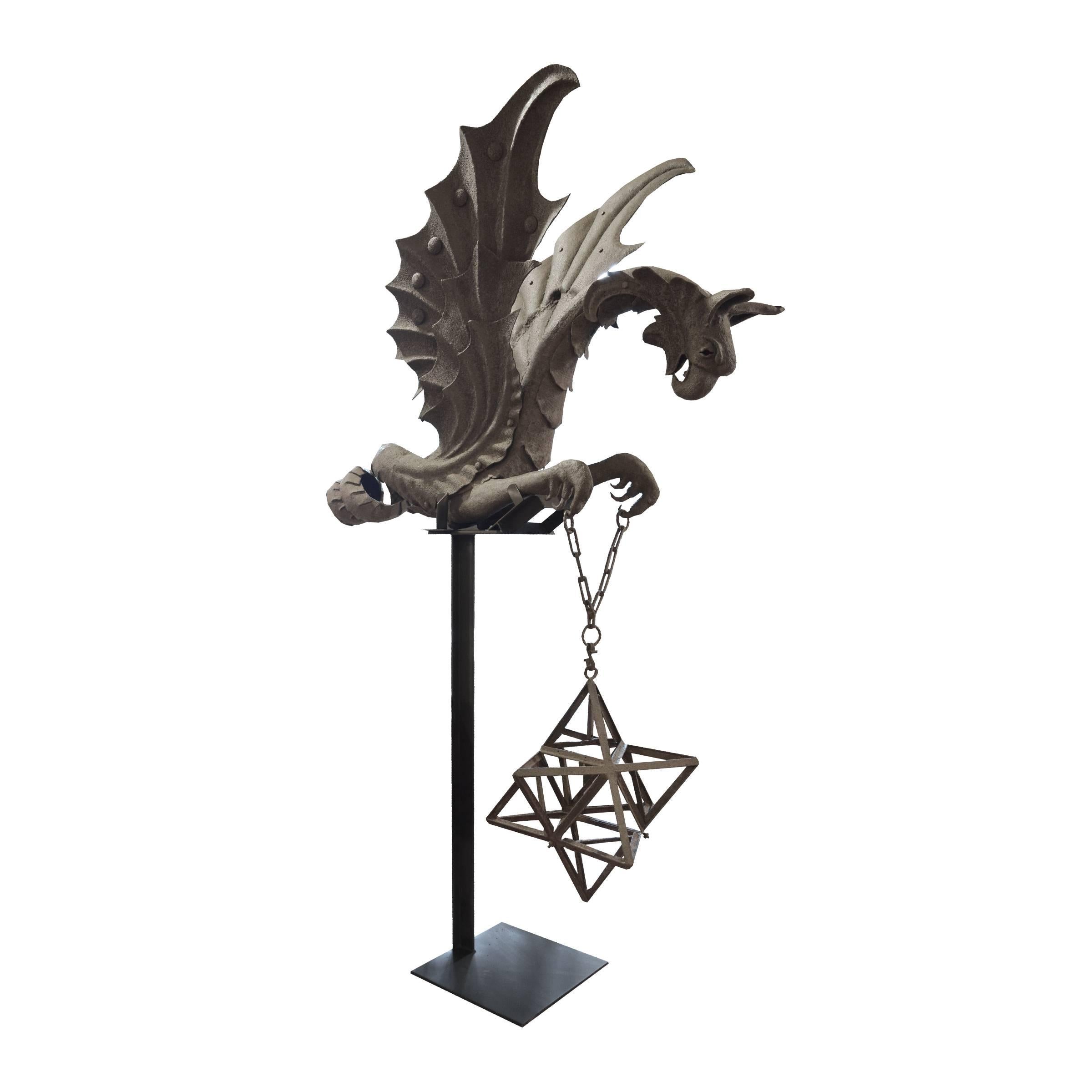 Absolutely the best Italian wrought iron sconce in the form of a griffin with open wings, coiled tail, and claws holding a Moravian star light fixture, 19th century. Mounted on a custom stand.
Requires wiring.
 