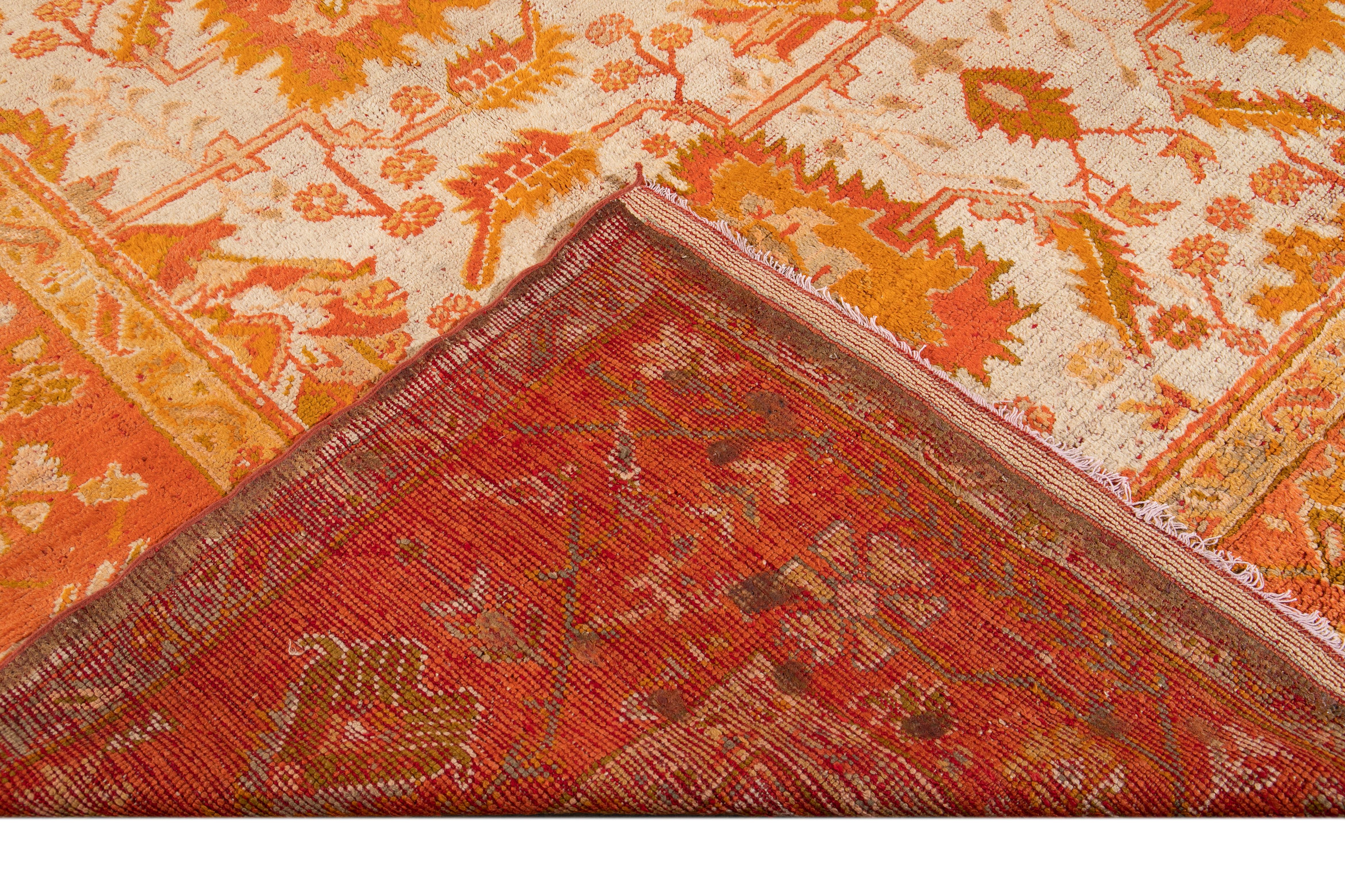 19th Century Ivory and Orange Turkish Oushak Rug For Sale 8