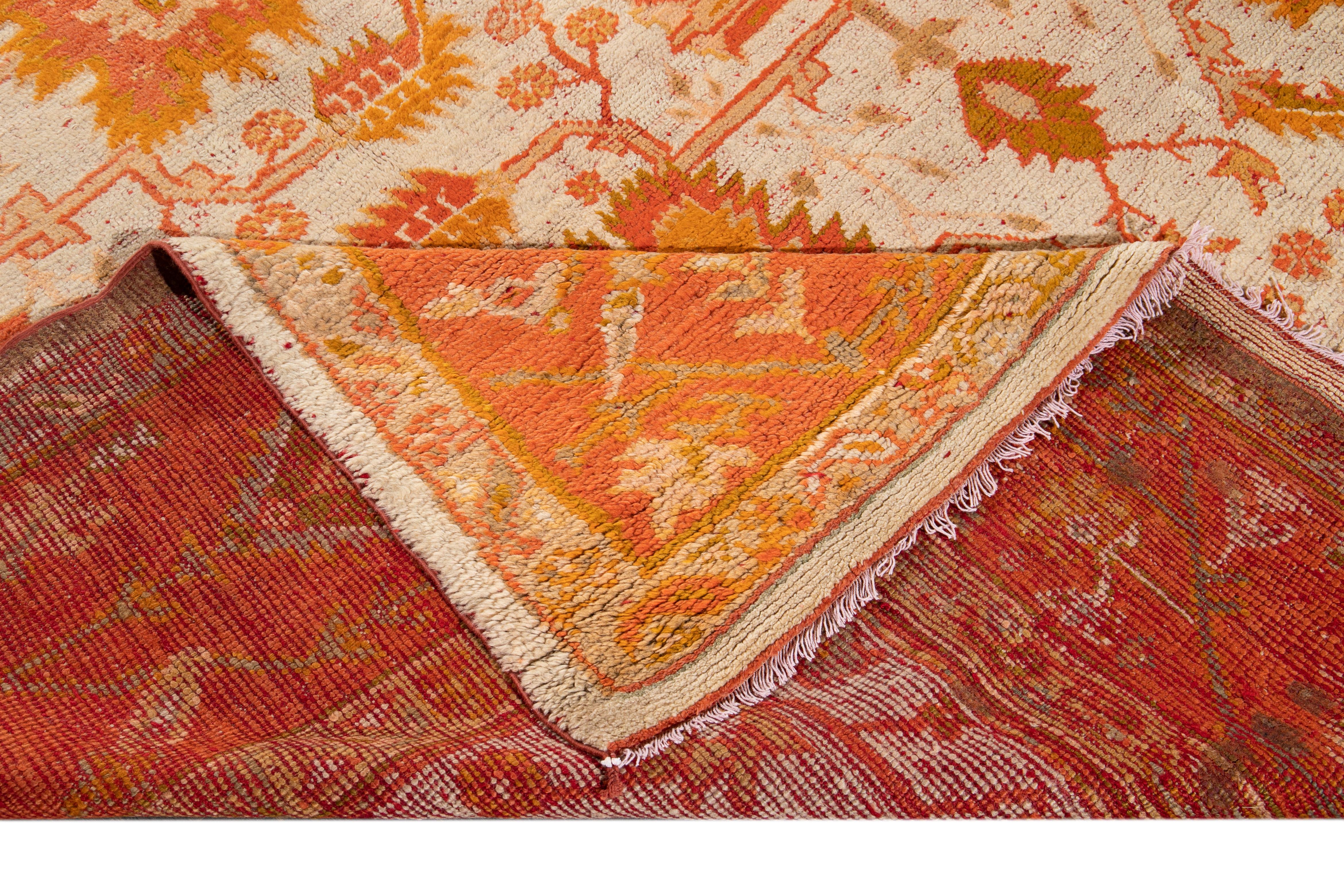 19th Century Ivory and Orange Turkish Oushak Rug For Sale 9