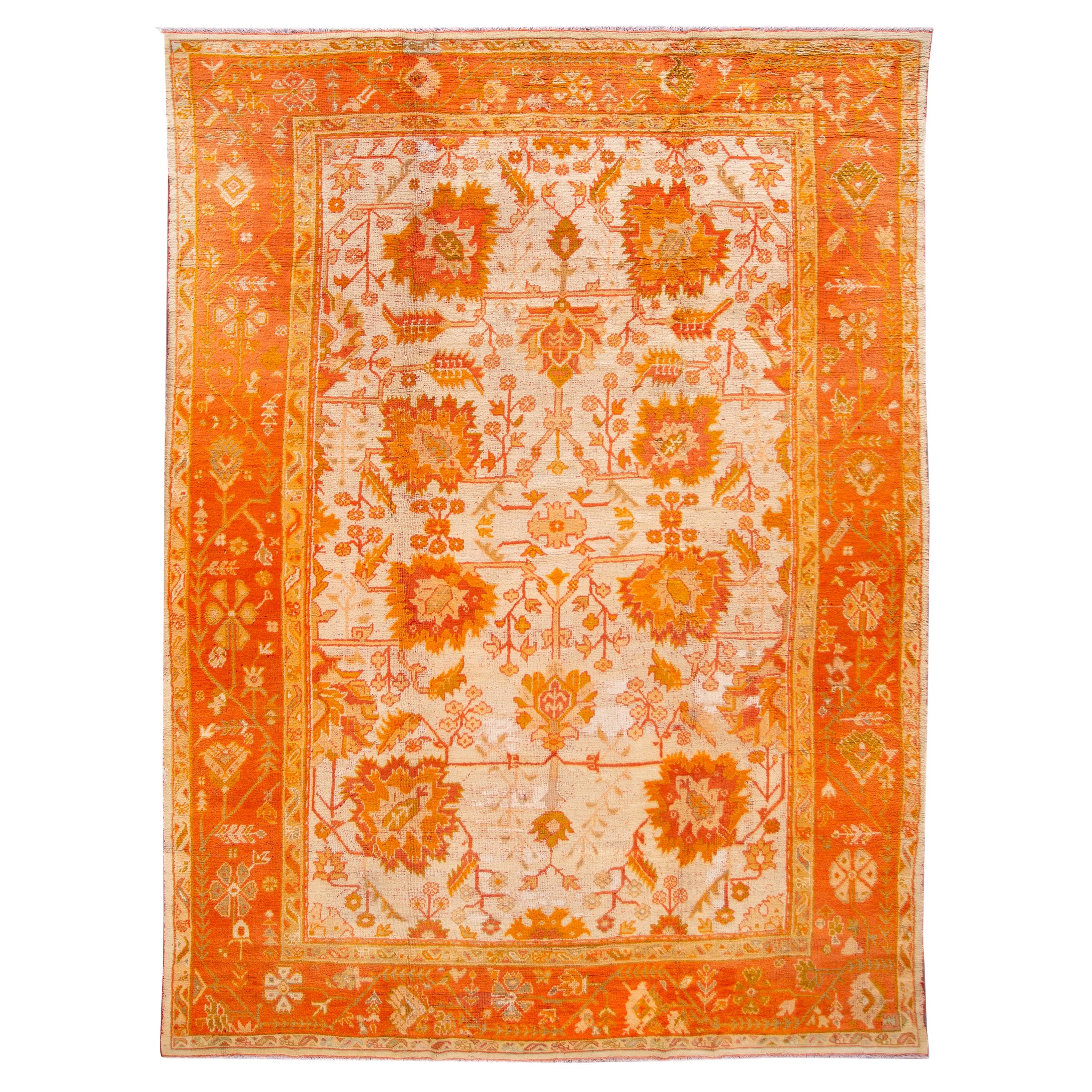 19th Century Ivory and Orange Turkish Oushak Rug For Sale