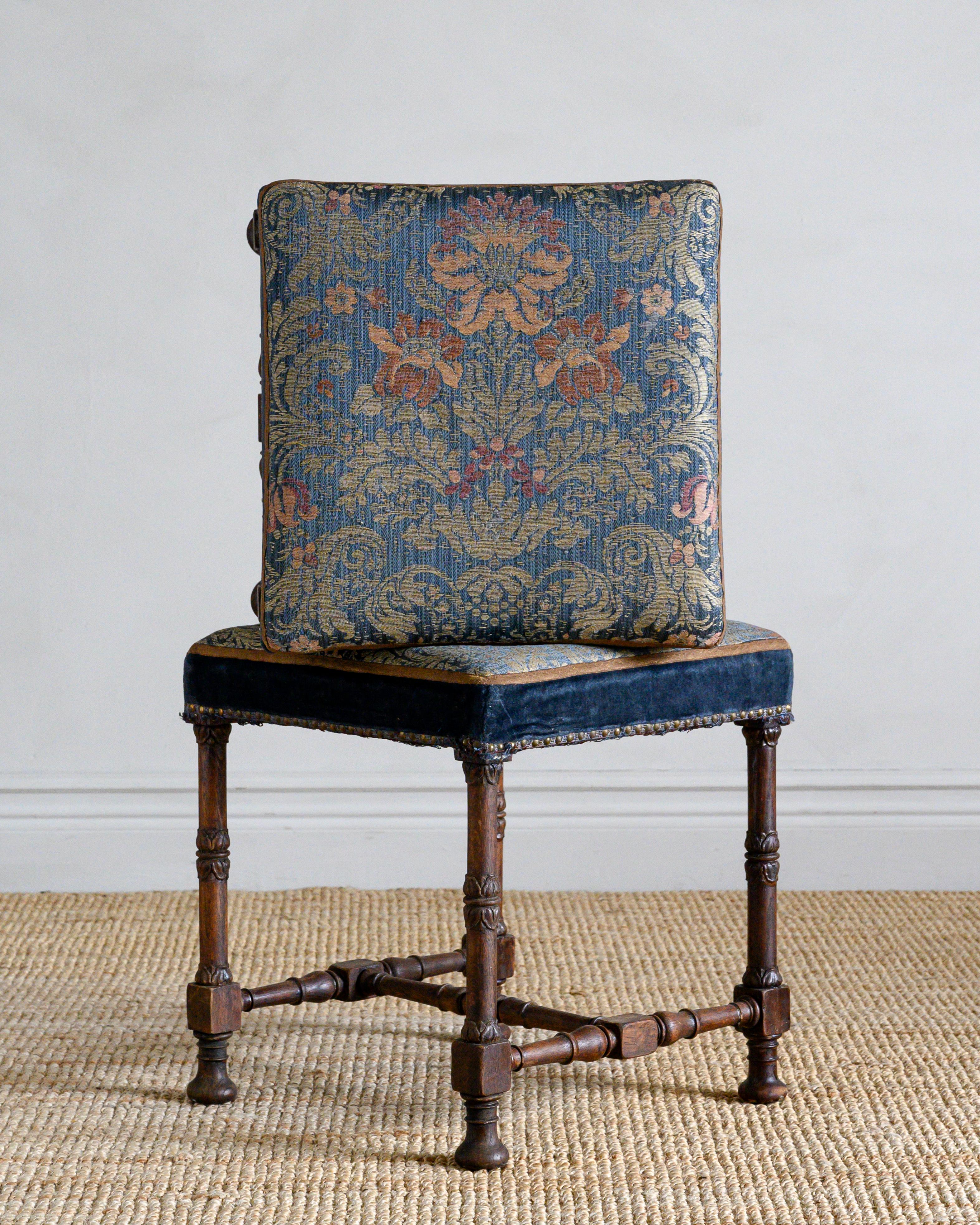 Fine pair of 19th century Jacobean revival stools in their wonderful original upholstery, circa 1880, England.

Good condition with wear consistent with age and use. Structurally good and sturdy. A detailed condition report is available on request.