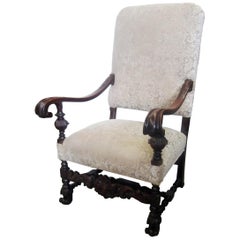 Fauteuil tapissé en noyer sculpté de style jacobéen du 19e siècle