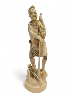 19th Century Japanese Bone Carving of a Grape Seller, Signed