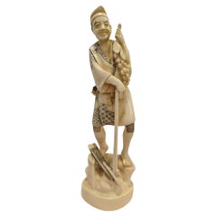 19th Century Japanese Bone Carving of a Grape Seller, Signed