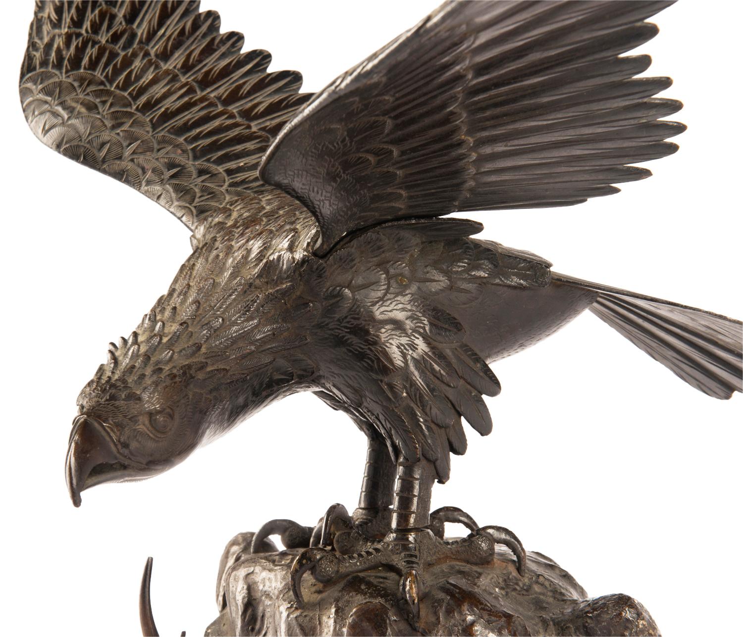 A very good quality Meiji period (1868-1912) Japanese bronze eagle mounted on a tree trunk.