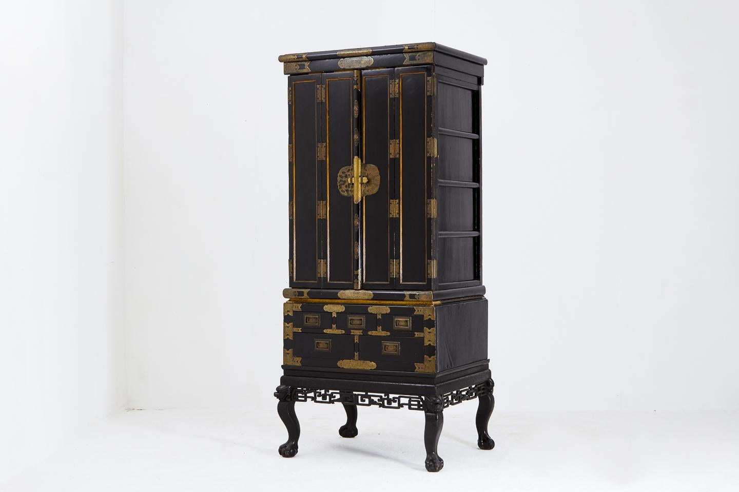 Wonderful example of a late 19th century Japanese black lacquer Butsudan cabinet with engraved brass mounts and giltwood interior.

A real statement piece of furniture.