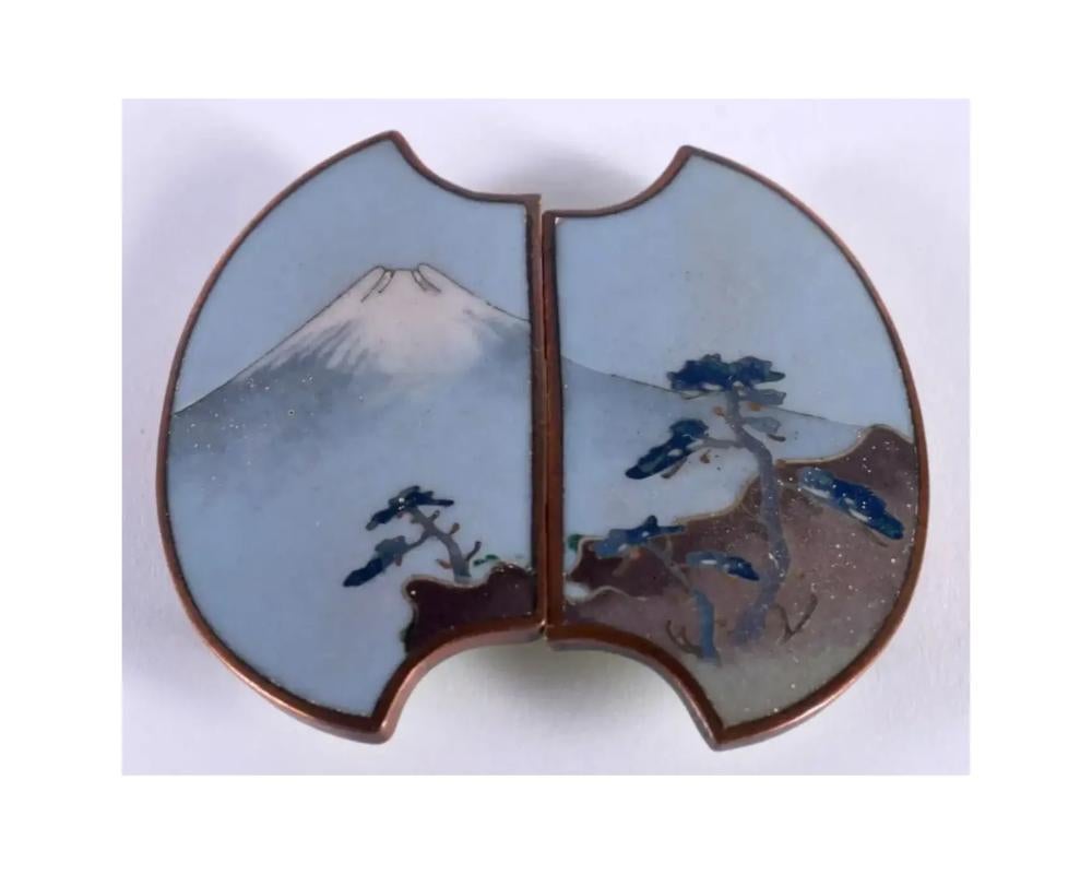 19th Century Japanese Cloisonne Enamel Meiji Period Mount Fuji Belt Buckle
This exquisite 19th-century Japanese Cloisonné Enamel Meiji Period belt buckle showcases masterful craftsmanship and intricate artistry. Crafted during the Meiji era