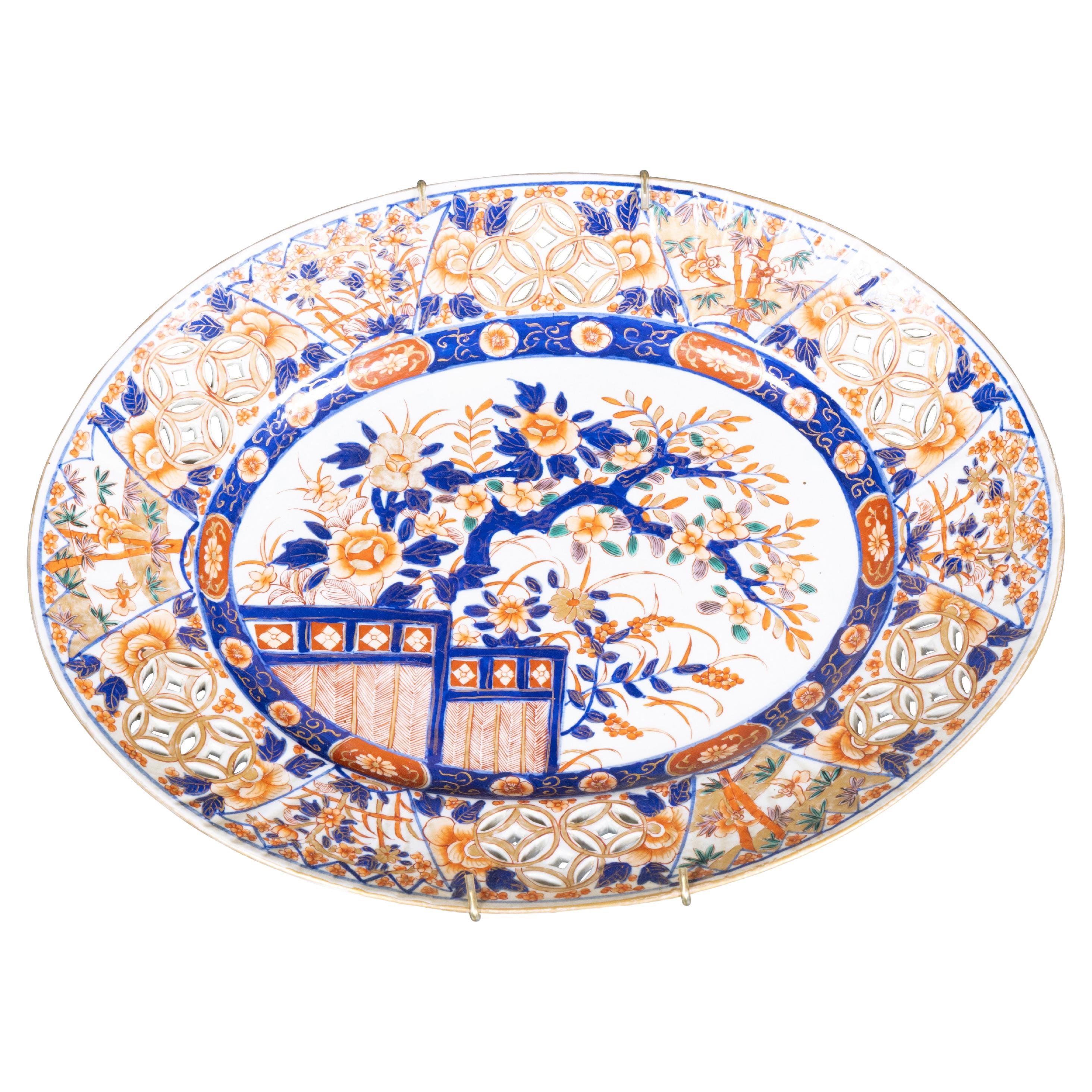 19th Century Japanese Imari Porcelain Oval Charger with Floral and Bamboo Decor For Sale