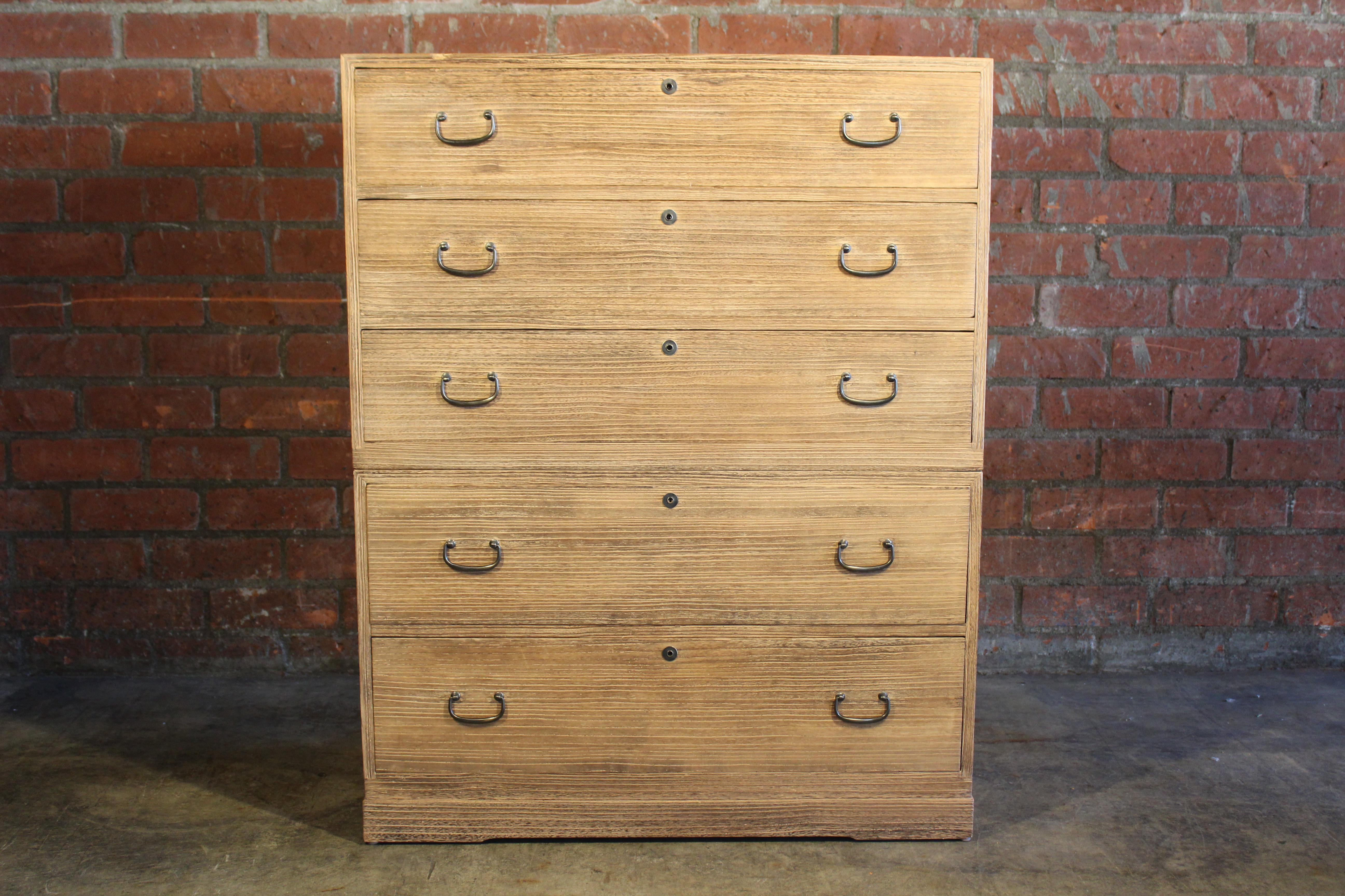 An antique two-part Japanese tansu kimono chest of drawers. In good condition original finish.