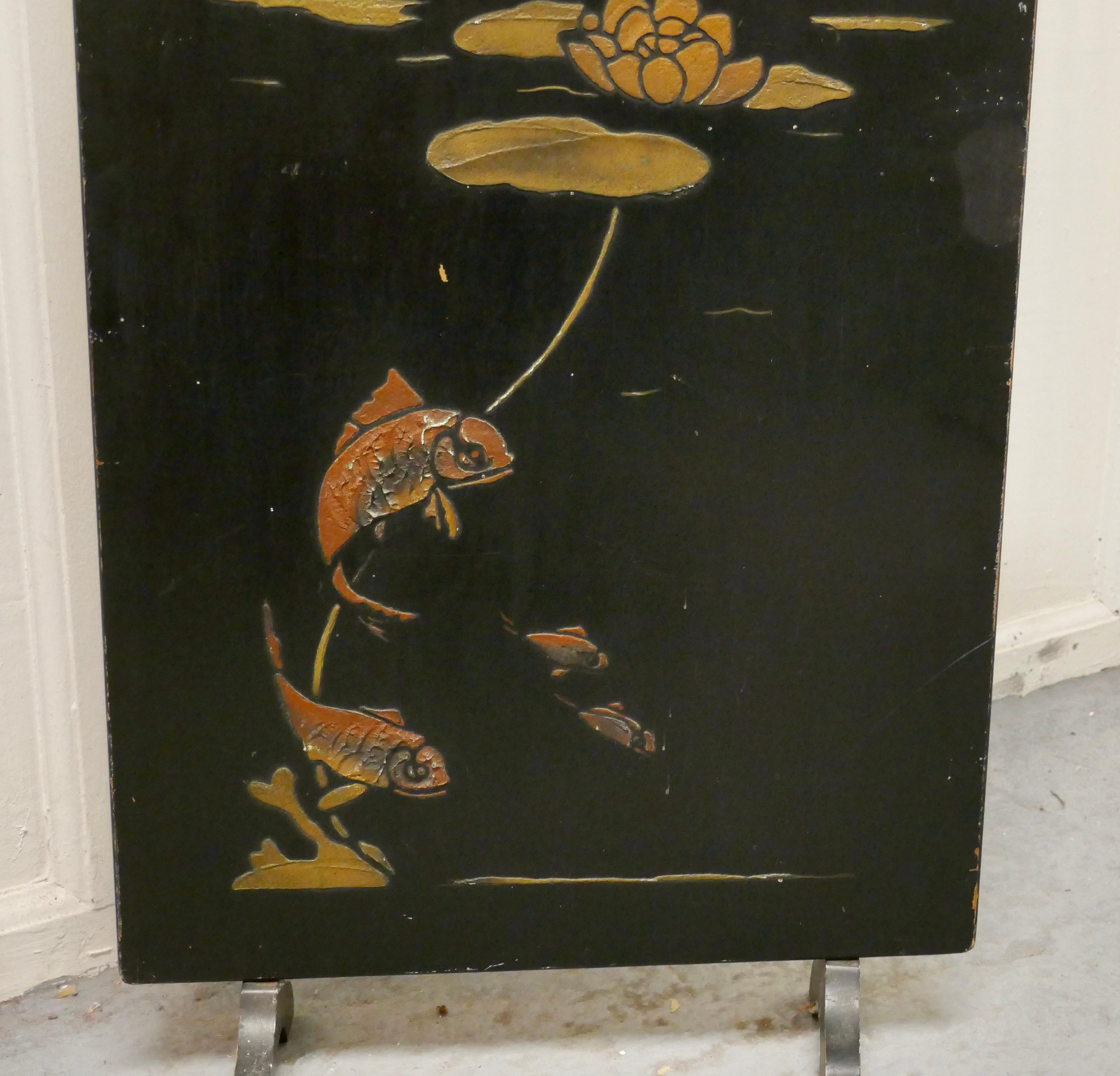 19th century Japanese lacquer fire Ssreen, decorated with carp

The screen has lacquered panels with embossed decoration of carp for good luck swimming breneath a lilly pad

The screen is in slightly distressed finish but otherwise sound
The