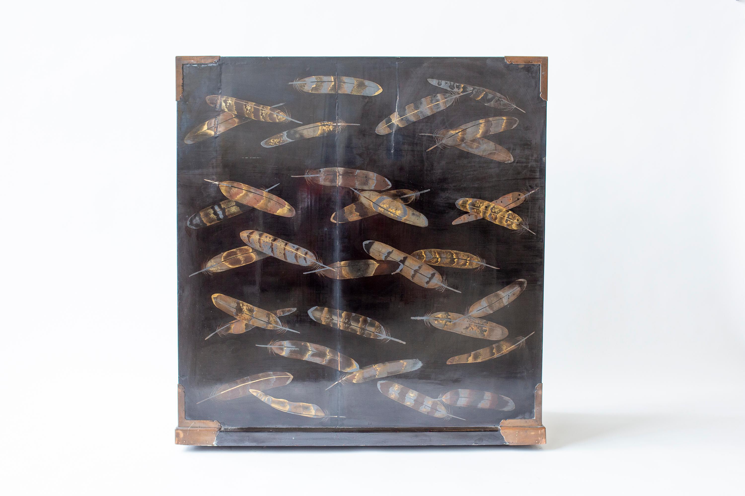 Lacquered 19th century Japanese Lacquer Tansu with Hawk Feather Design For Sale
