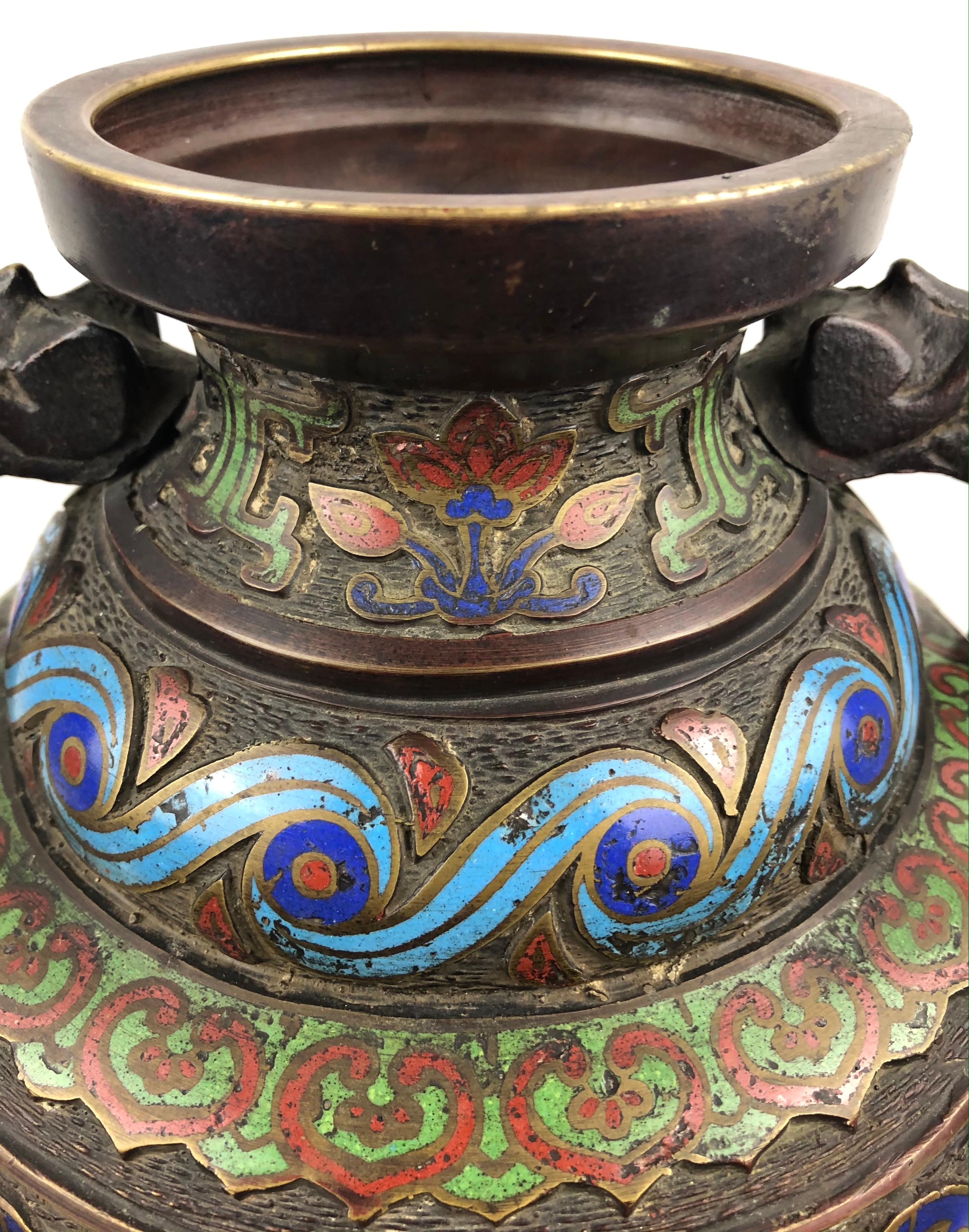 Excellent quality example of fine Japanese bronze cloisonne vase from the Meiji era.

The Meiji period is a Japanese era which extended from 1868 to 1912. It corresponds to the reign of Emperor Meiji. 

Measures: 11 3/4