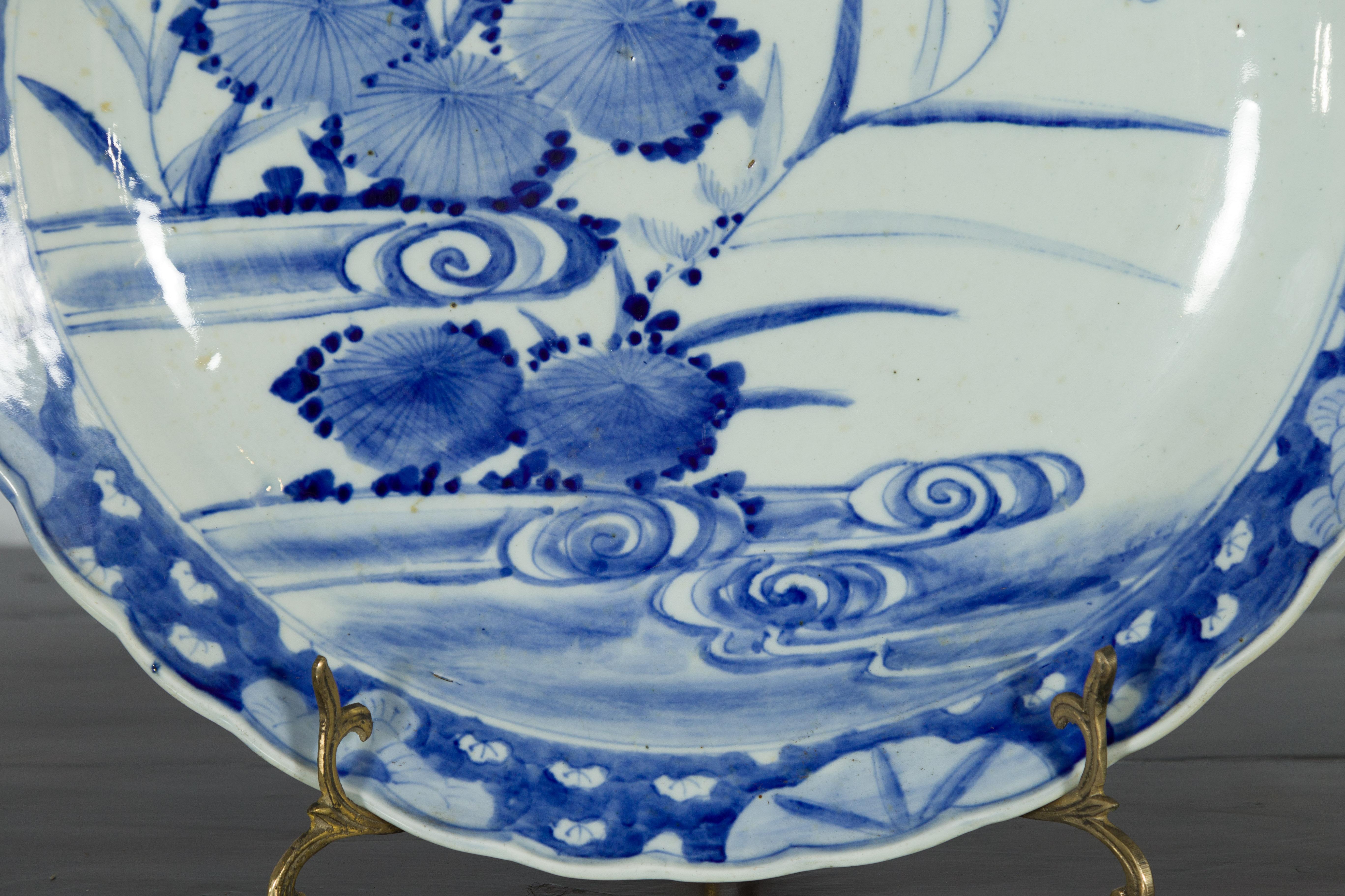 19th Century Japanese Porcelain Imari Plate with Painted Blue and White Décor For Sale 8