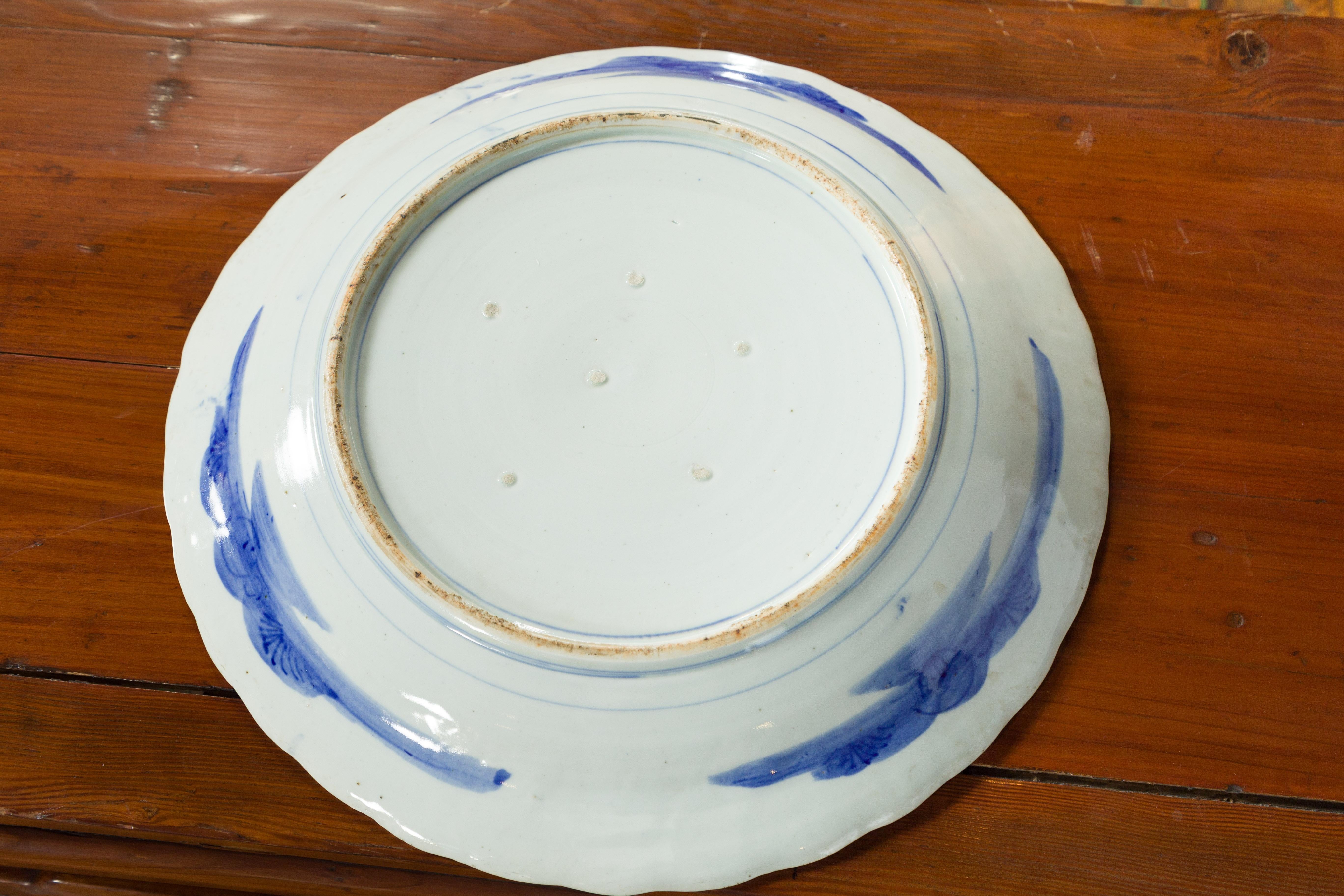 19th Century Japanese Porcelain Imari Plate with Painted Blue and White Décor For Sale 13