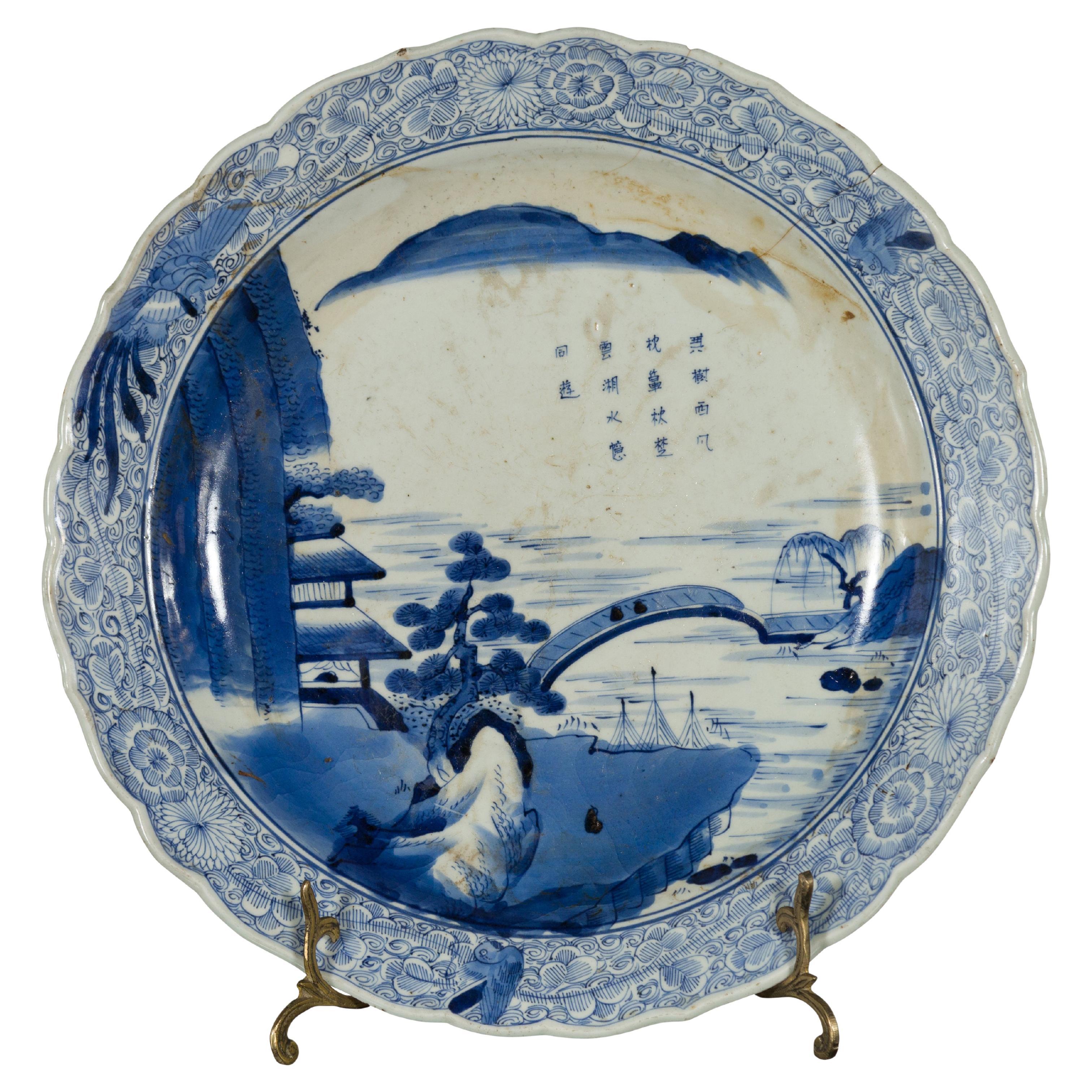 19th Century Japanese Porcelain Imari Plate with Painted Blue and White Décor For Sale