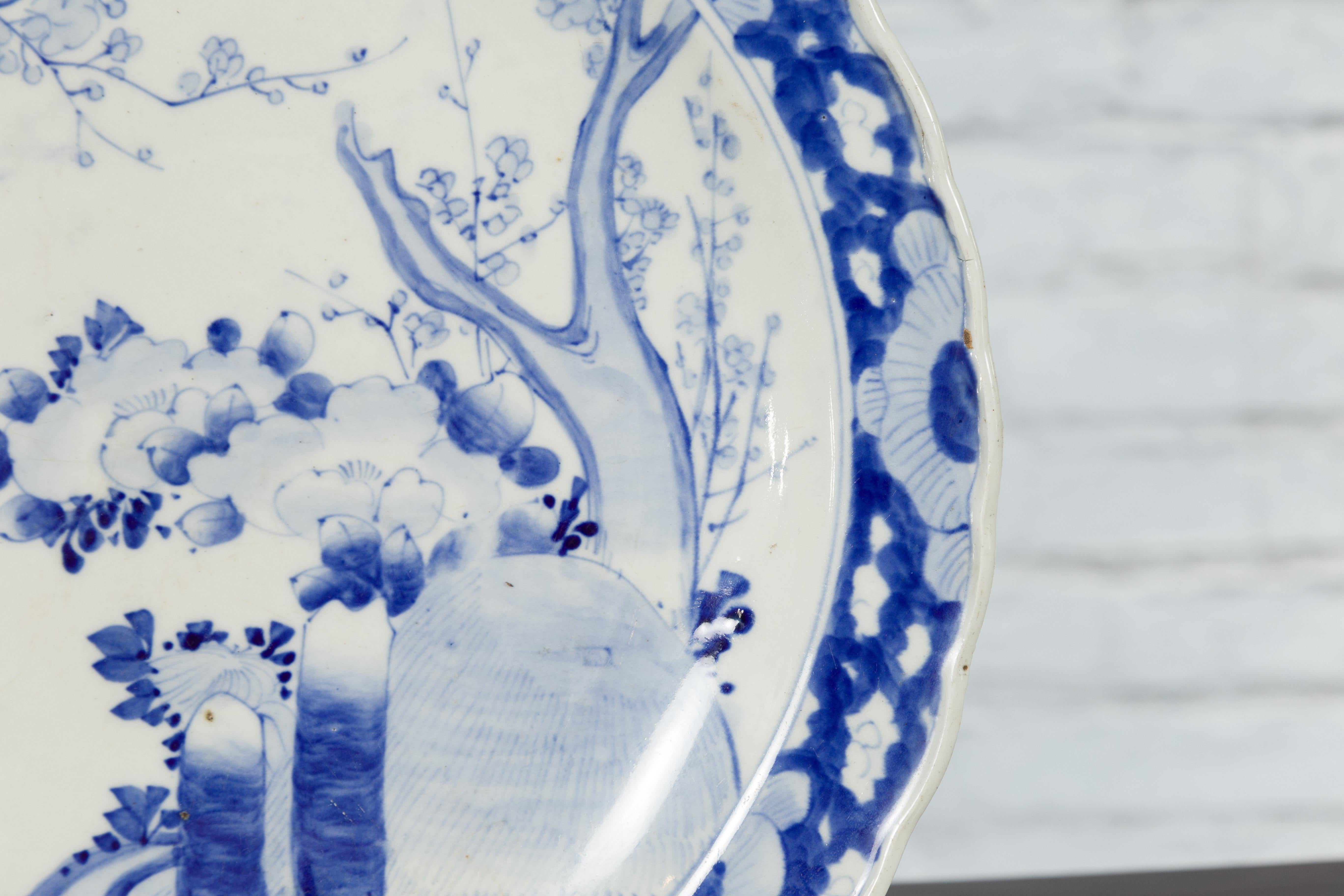 19th Century Japanese Porcelain Plate with Hand-Painted Blue and White Décor For Sale 7