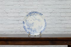 19th Century Japanese Porcelain Plate with Hand-Painted Blue and White Décor